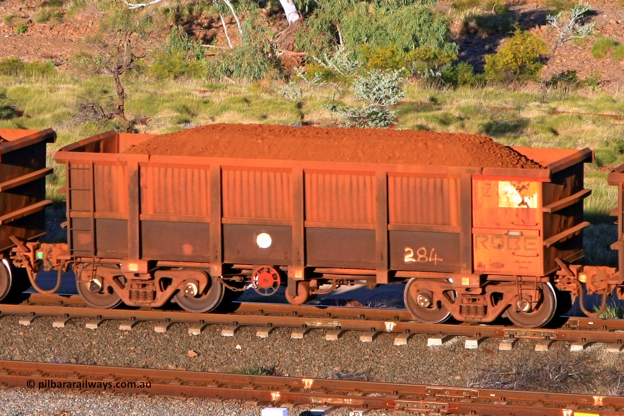 0284 110602 1639
Robe River ore waggon 284, built by Nippon Sharyo Nihon, rotary coupler end handbrake side loaded view at the 71 km, Western Creek on the Deepdale line. June 2, 2011.
Keywords: 284;Nippon-Sharyo-Nihon;Robe-ore-waggon;