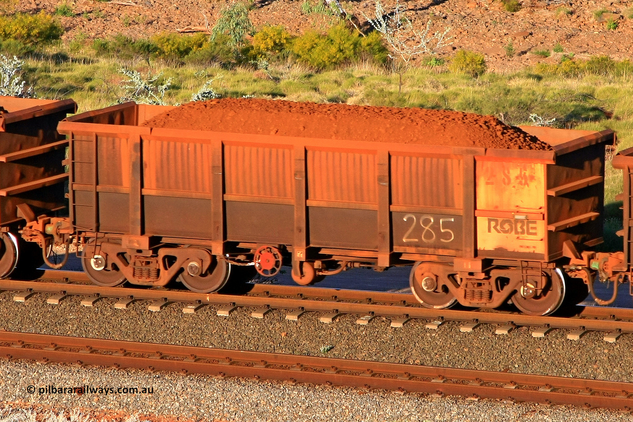 0285 110602 1709
Robe River ore waggon 285, built by Nippon Sharyo Nihon, rotary coupler end handbrake side loaded view at the 71 km, Western Creek on the Deepdale line. June 2, 2011.
Keywords: 285;Nippon-Sharyo-Nihon;Robe-ore-waggon;
