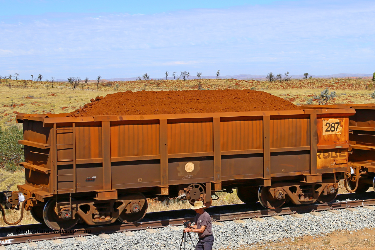 0287 170729 0276
Robe River ore waggon 287, built by Nippon Sharyo Nihon, fixed coupler handbrake side loaded view at the 103 km, between Maitland Siding and the Fortescue River on the Deepdale line. July 29, 2017.
Keywords: 287;Nippon-Sharyo-Nihon;Robe-ore-waggon;