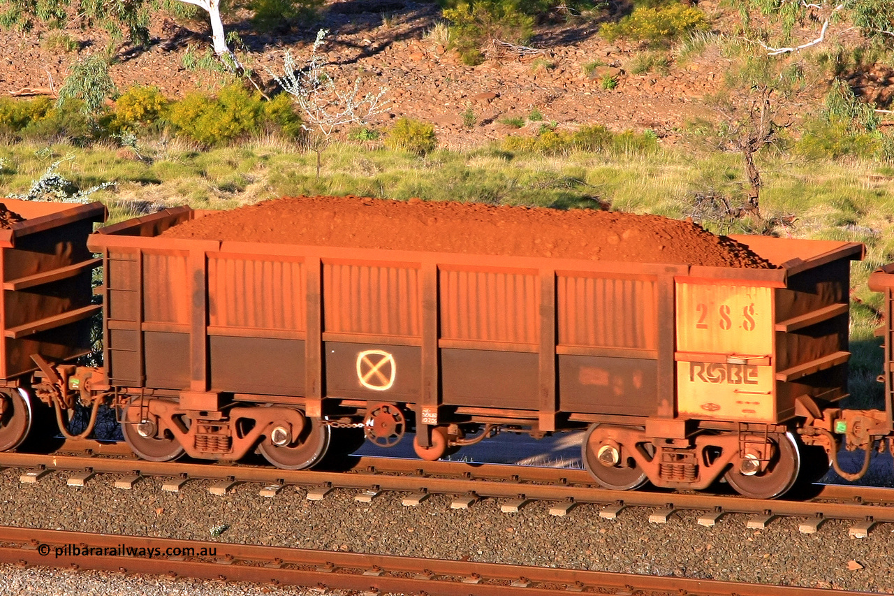 0288 110602 1692
Robe River ore waggon 288, built by Nippon Sharyo Nihon, rotary coupler end handbrake side loaded view at the 71 km, Western Creek on the Deepdale line. June 2, 2011.
Keywords: 288;Nippon-Sharyo-Nihon;Robe-ore-waggon;