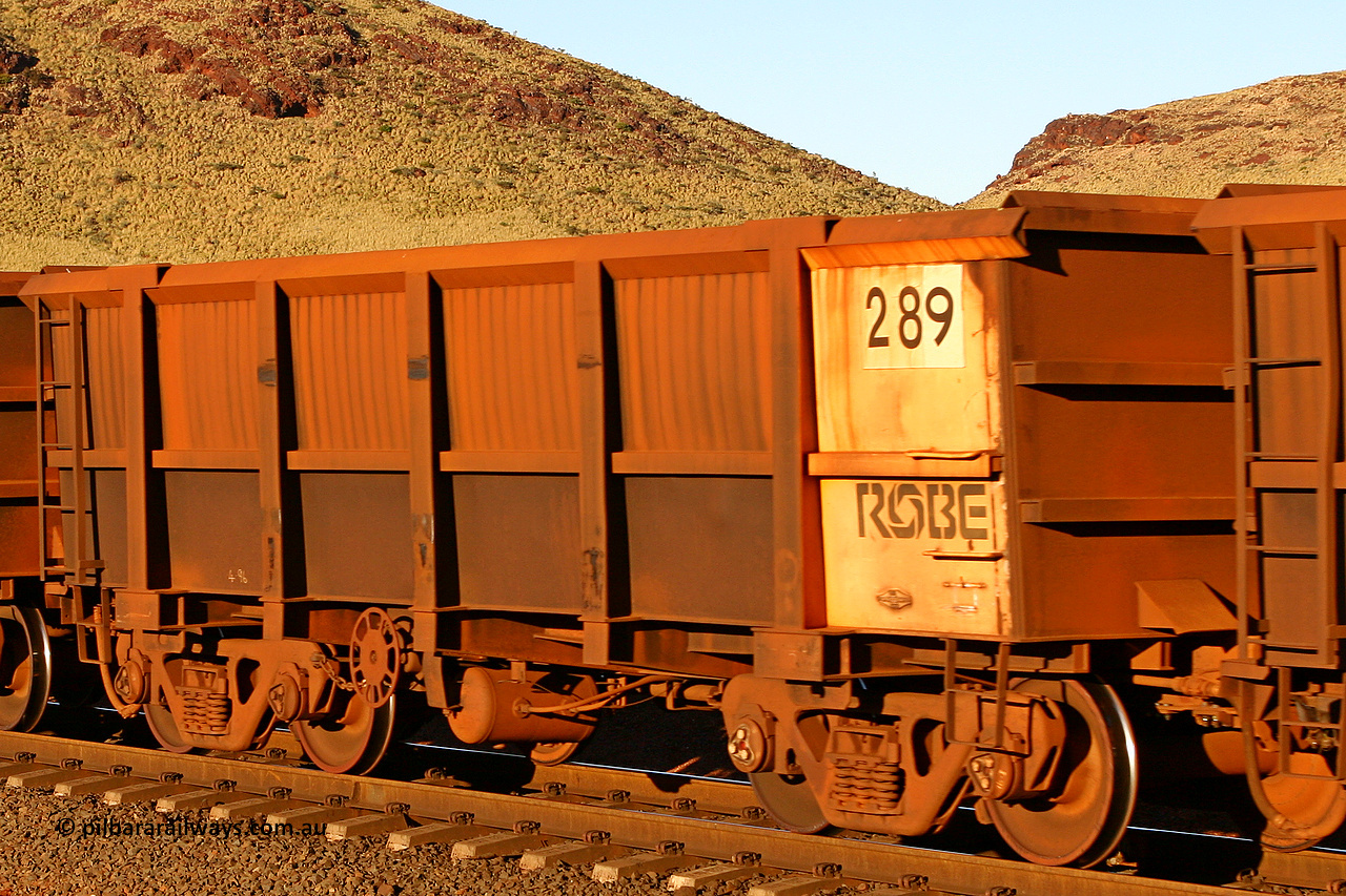 0289 060722 7595
Robe River ore waggon 289, built by Nippon Sharyo Nihon, rotary coupler end handbrake side empty view, at the 11.7 km, Cape Lambert. July 22, 2006.
Keywords: 289;Nippon-Sharyo-Nihon;Robe-ore-waggon;