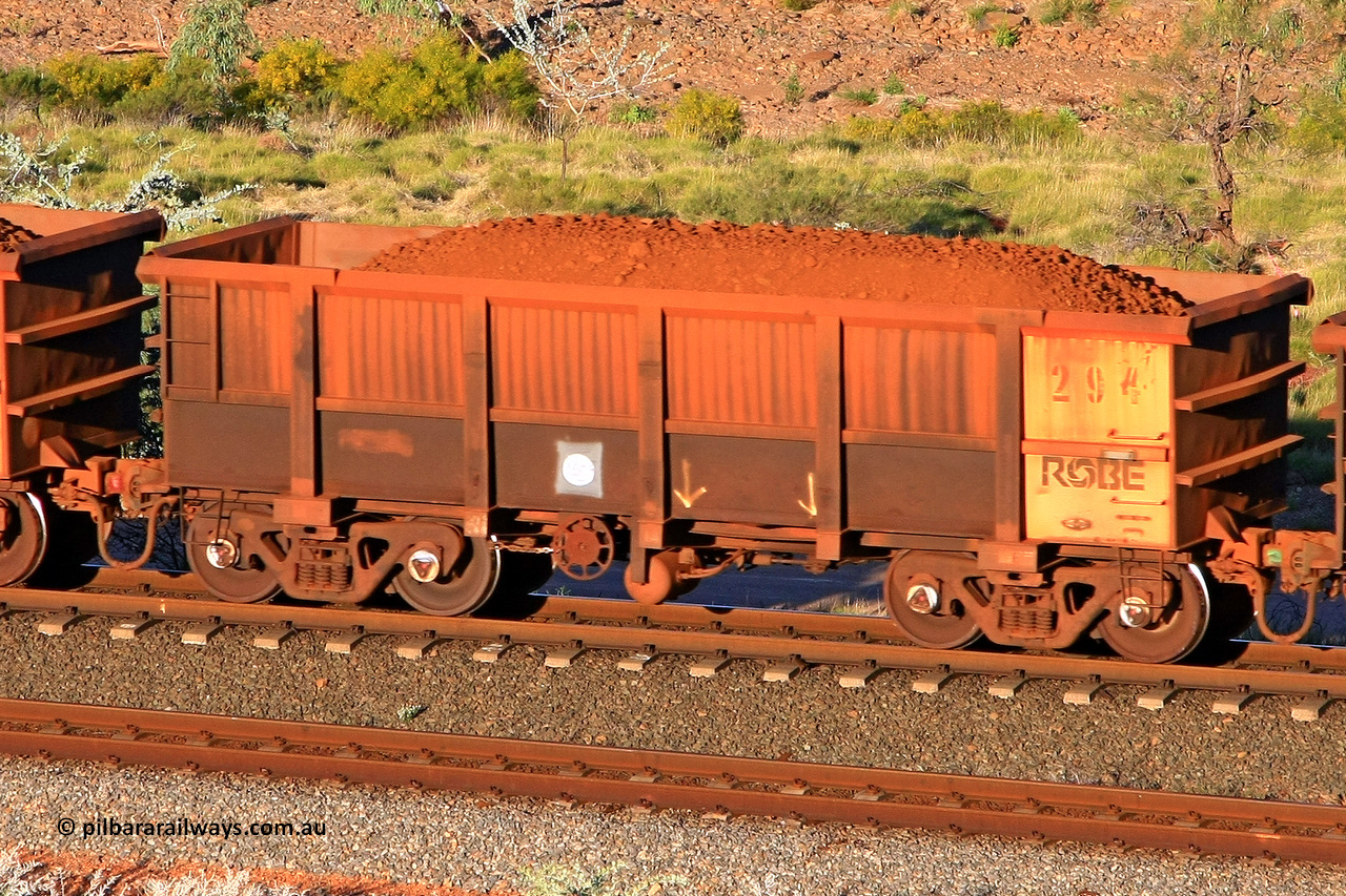 0294 110602 1736
Robe River ore waggon 294, built by Nippon Sharyo Nihon, rotary coupler end handbrake side loaded view at the 71 km, Western Creek on the Deepdale line. June 2, 2011.
Keywords: 294;Nippon-Sharyo-Nihon;Robe-ore-waggon;