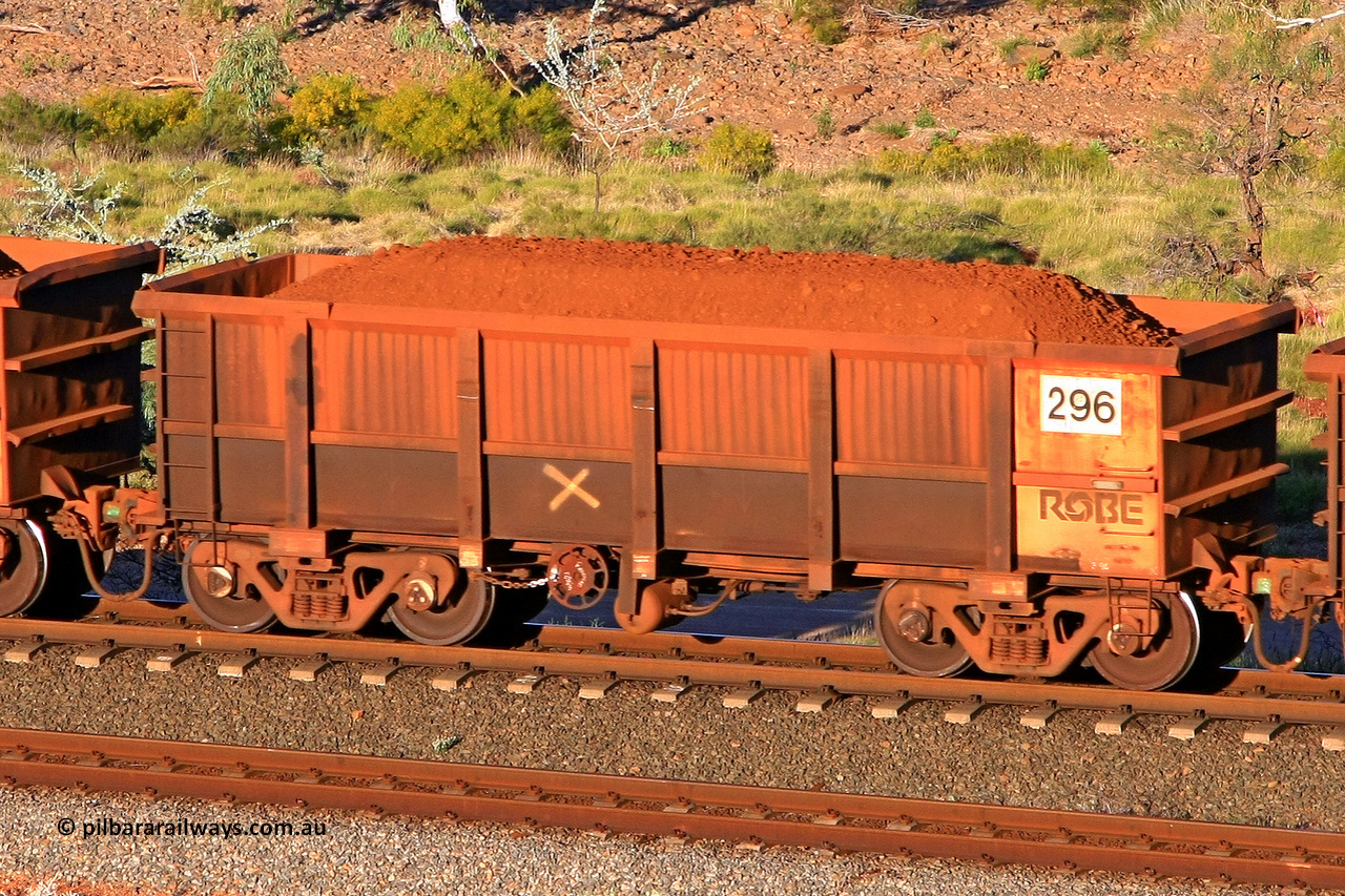 0296 110602 1695
Robe River ore waggon 296, built by Nippon Sharyo Nihon, rotary coupler end handbrake side loaded view at the 71 km, Western Creek on the Deepdale line. June 2, 2011.
Keywords: 296;Nippon-Sharyo-Nihon;Robe-ore-waggon;