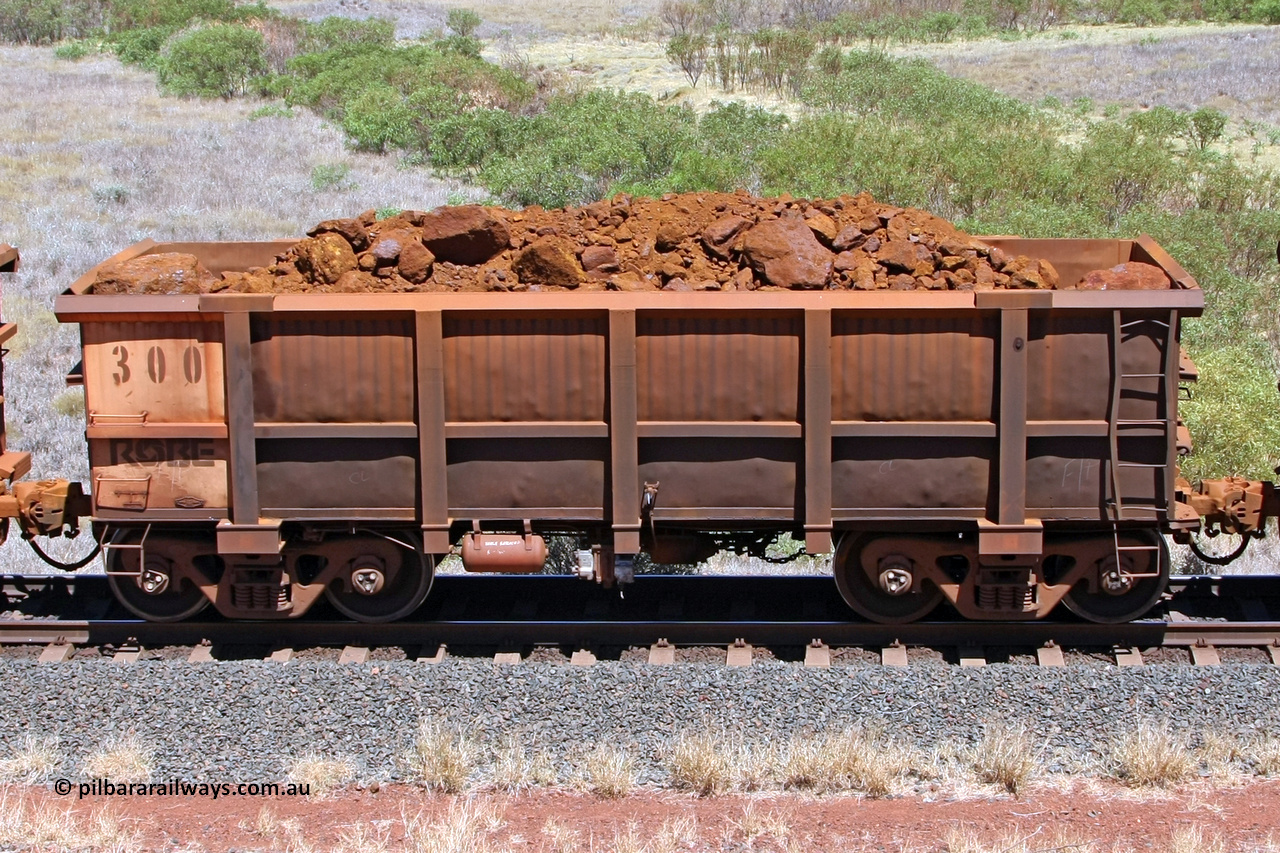 0300 081209 0149
Robe River ore waggon 300, built by Nippon Sharyo Nihon, non-handbrake side loaded view at the 7 km location just south of Cape Lambert yard. December 9, 2008.
Keywords: 300;Nippon-Sharyo-Nihon;Robe-ore-waggon;