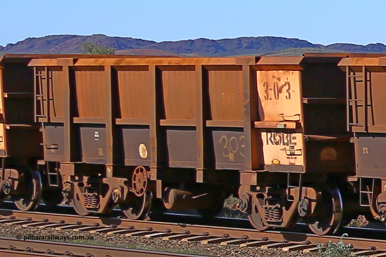 0303 160727 0965
Robe River ore waggon 303, built by Nippon Sharyo Nihon, rotary coupler end handbrake side empty view at Harding Siding on the Cape Lambert line, July 27, 2016.
Keywords: 303;Nippon-Sharyo-Nihon;Robe-ore-waggon;