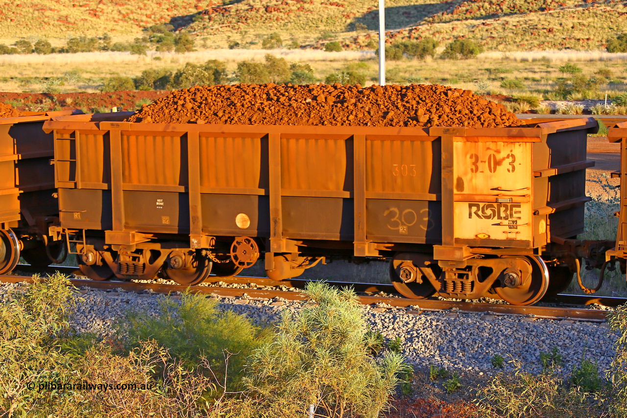 0303 170513 8631
Robe River ore waggon 303, built by Nippon Sharyo Nihon, rotary coupler end handbrake side loaded view, Cape Lambert yard, May 13, 2017.
Keywords: 303;Nippon-Sharyo-Nihon;Robe-ore-waggon;