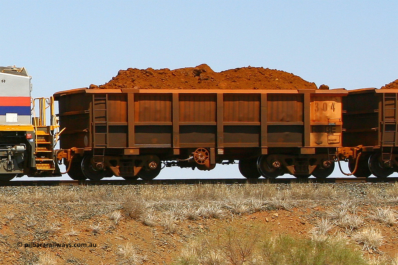 0304 070916 0993
Robe River ore waggon 304, built by Nippon Sharyo Nihon, fixed coupler handbrake side loaded view, at the 73 km, Western Creek on the Deepdale line. September 16, 2007.
Keywords: 304;Nippon-Sharyo-Nihon;Robe-ore-waggon;