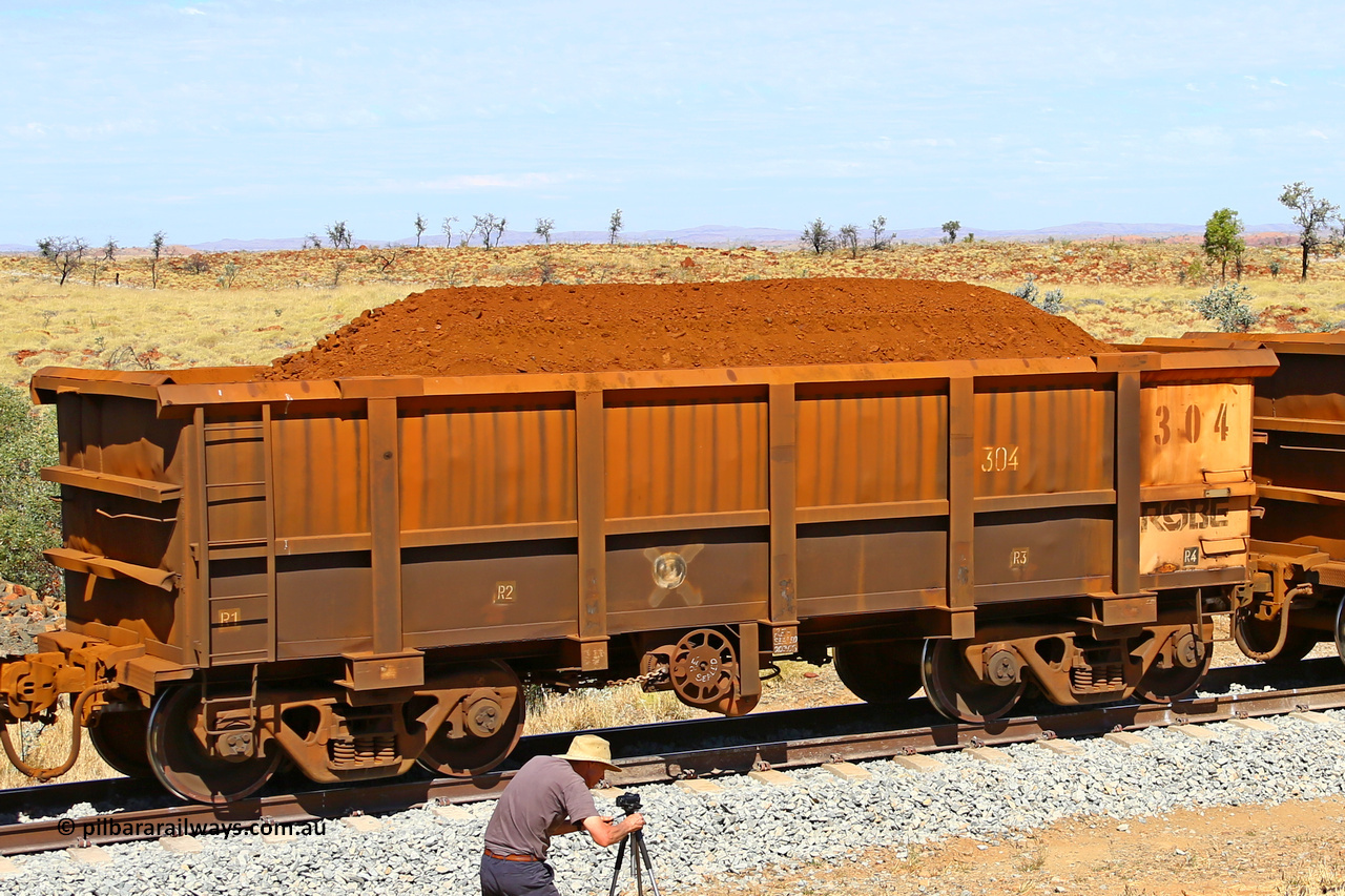 0304 170729 0264
Robe River ore waggon 304, built by Nippon Sharyo Nihon, fixed coupler handbrake side loaded view at the 103 km, between Maitland Siding and the Fortescue River on the Deepdale line. July 29, 2017.
Keywords: 304;Nippon-Sharyo-Nihon;Robe-ore-waggon;
