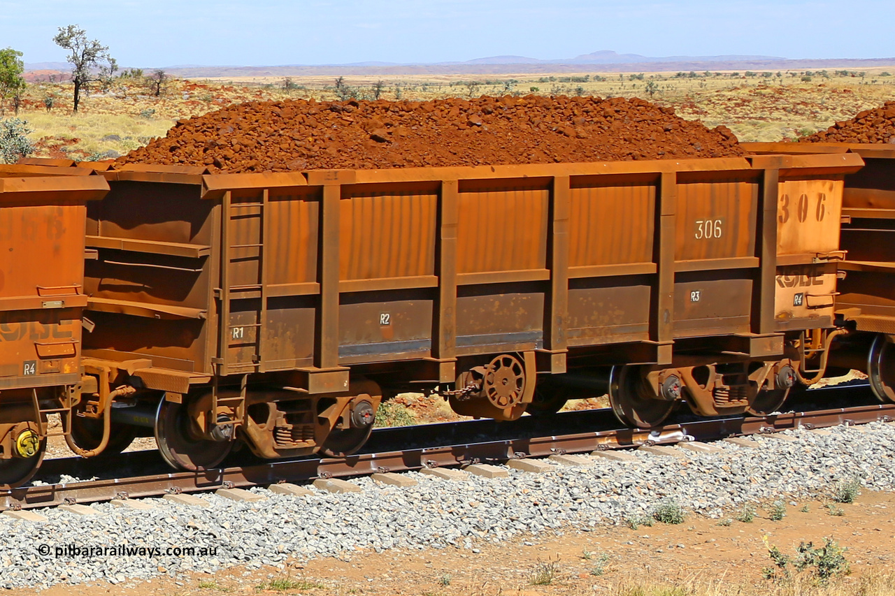 0306 170729 0201
Robe River ore waggon 306, built by Nippon Sharyo Nihon, fixed coupler handbrake side loaded view at the 103 km, between Maitland Siding and the Fortescue River on the Deepdale line. July 29, 2017.
Keywords: 306;Nippon-Sharyo-Nihon;Robe-ore-waggon;