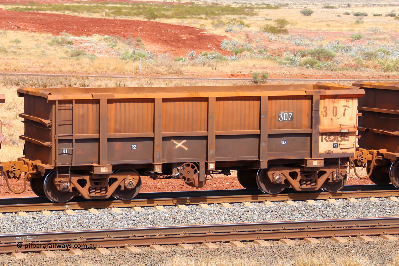0307 141124 6849
Robe River ore waggon 307, built by Nippon Sharyo Nihon, fixed coupler handbrake side empty view at the 25 km at Arches Siding on the Cape Lambert line. November 24, 2014.
Keywords: 307;Nippon-Sharyo-Nihon;Robe-ore-waggon;