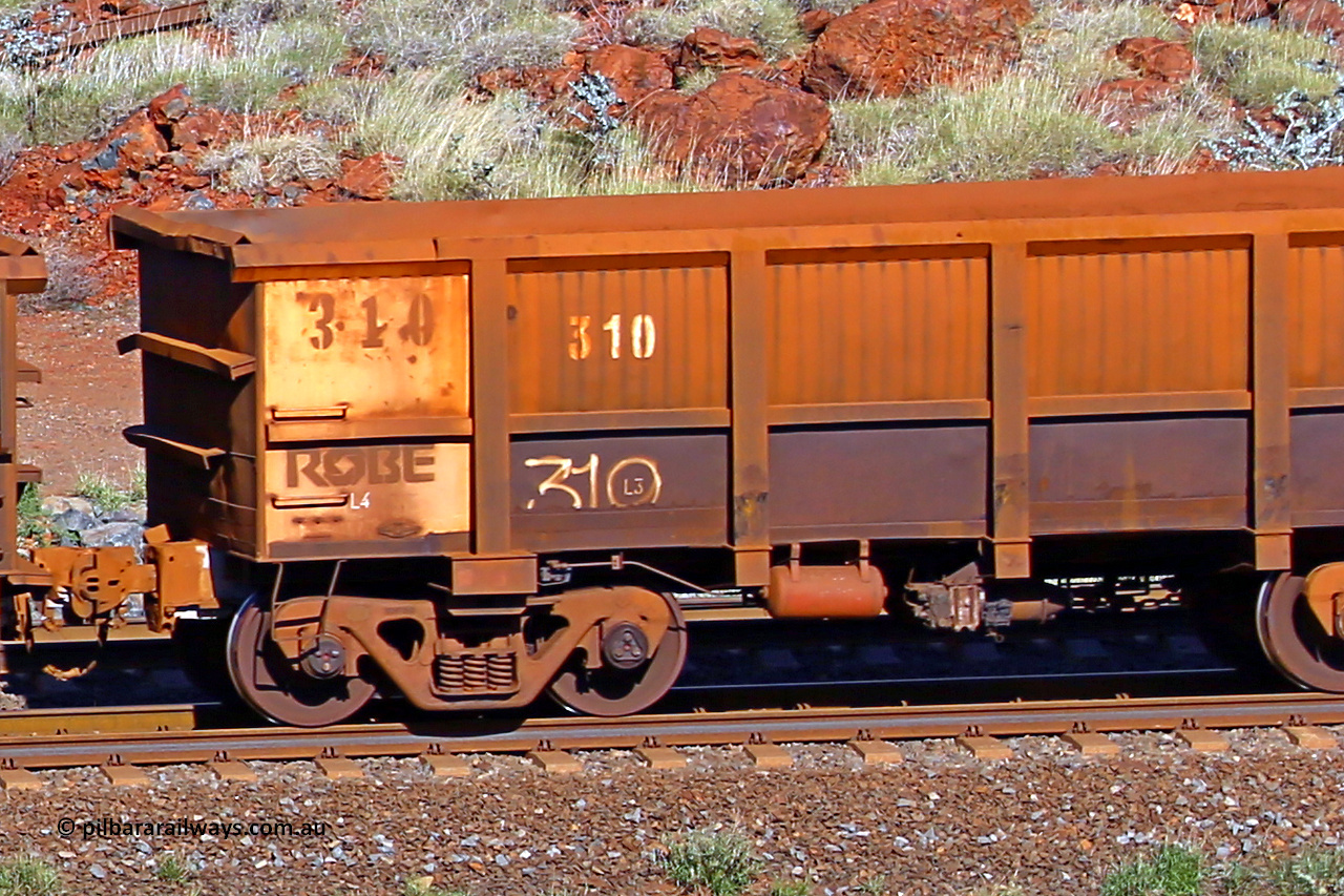 0310 180616 1742
Robe River ore waggon 310, built by Nippon Sharyo Nihon, rotary coupler end non-handbrake side empty view at the 38 km, Harding on the Cape Lambert line, June 16, 2018.
Keywords: 310;Nippon-Sharyo-Nihon;Robe-ore-waggon;