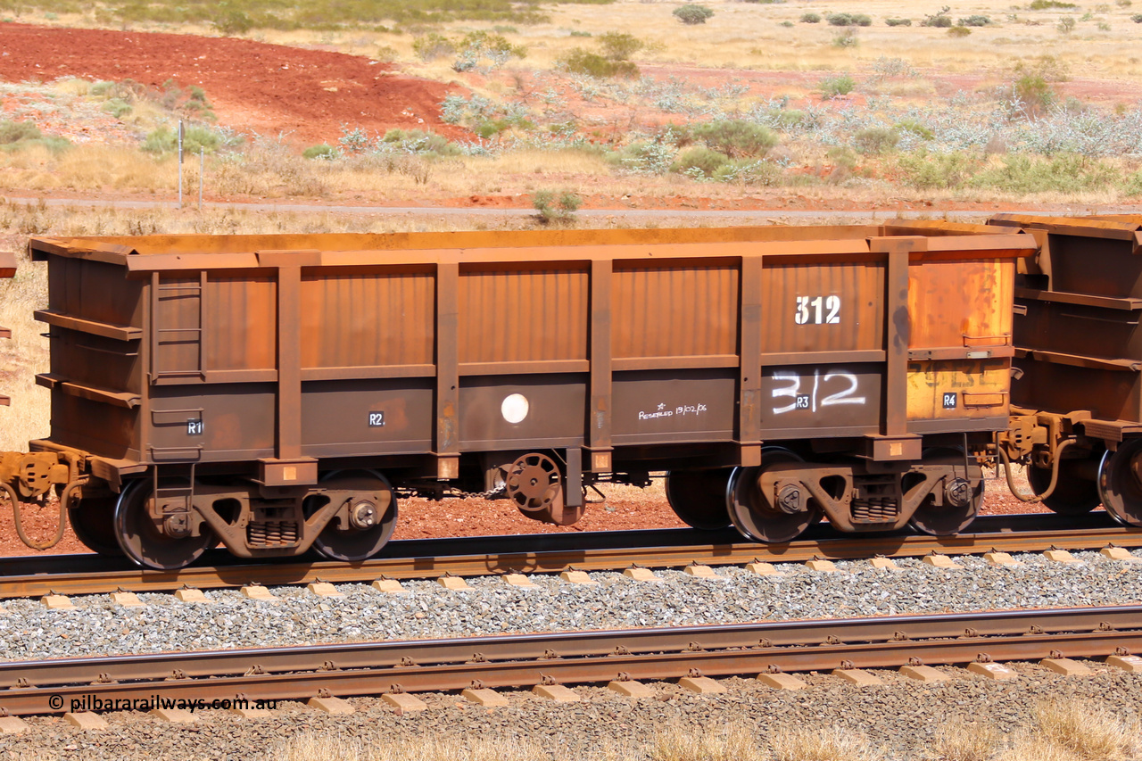 0312 141124 6807
Robe River ore waggon 312, built by Nippon Sharyo Nihon, fixed coupler handbrake side empty view at the 25 km at Arches Siding on the Cape Lambert line. November 24, 2014.
Keywords: 312;Nippon-Sharyo-Nihon;Robe-ore-waggon;