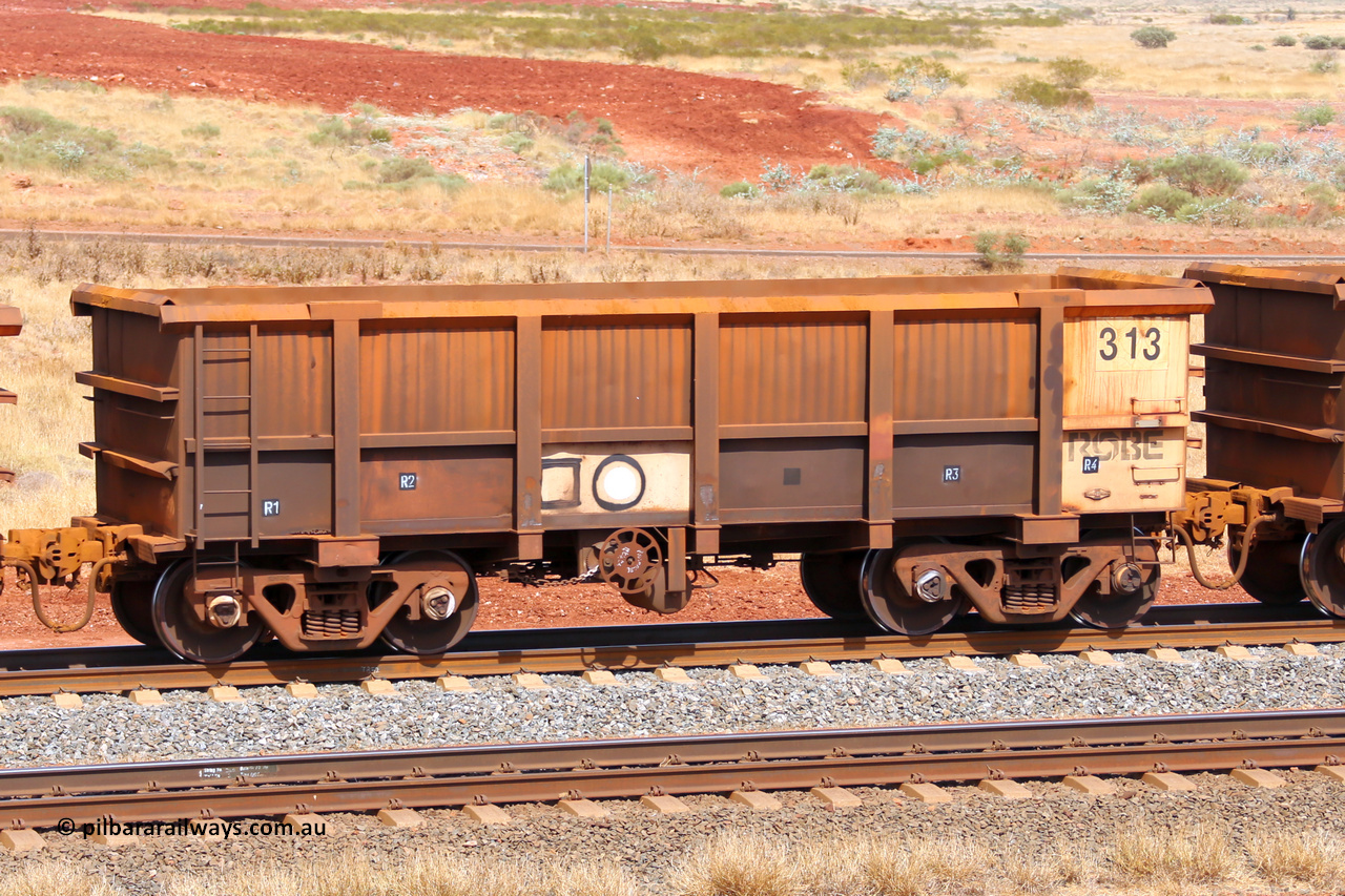 0313 141124 6851
Robe River ore waggon 313, built by Nippon Sharyo Nihon, fixed coupler handbrake side empty view at the 25 km at Arches Siding on the Cape Lambert line. November 24, 2014.
Keywords: 313;Nippon-Sharyo-Nihon;Robe-ore-waggon;