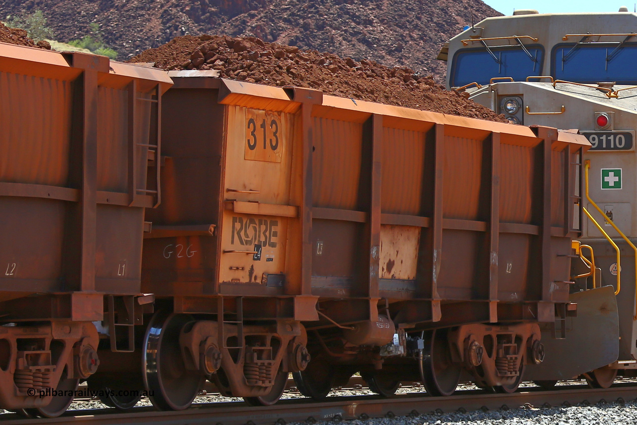0313 160306 1416
Robe River ore waggon 313, built by Nippon Sharyo Nihon, rotary coupler end non-handbrake side loaded view at Greenpool Siding on the Cape Lambert line. March 6, 2016.
Keywords: 313;Nippon-Sharyo-Nihon;Robe-ore-waggon;