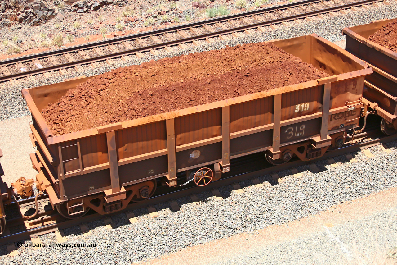 0319 160306 1461
Robe River ore waggon 319, built by Nippon Sharyo Nihon, fixed coupler handbrake side loaded view at the 45 km, Harding Siding on the Cape Lambert line. March 6, 2016.
Keywords: 319;Nippon-Sharyo-Nihon;Robe-ore-waggon;