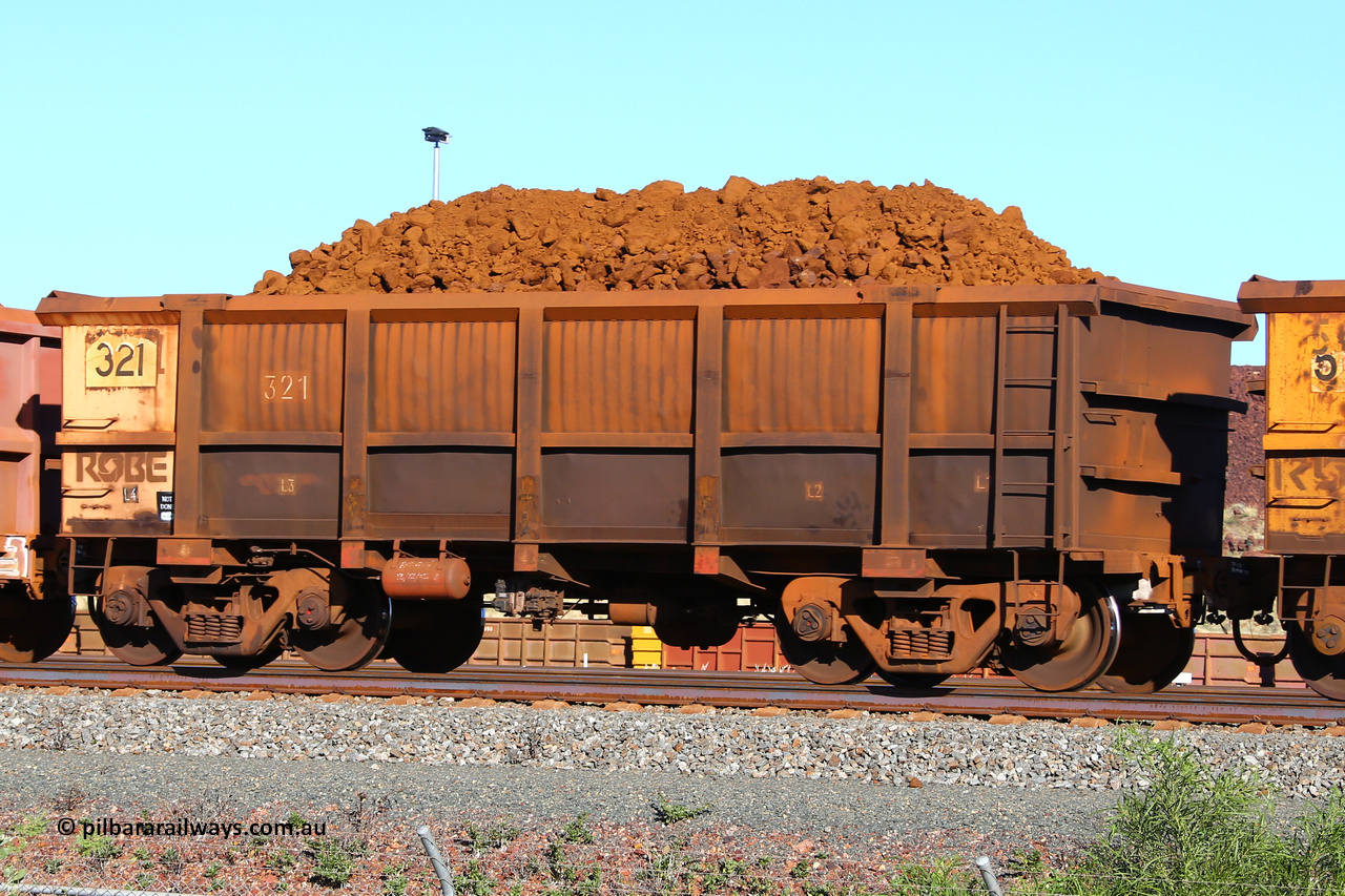 0321 210322 9390
Robe River ore waggon 321, built by Nippon Sharyo Nihon, rotary coupler end non-handbrake side loaded view at the 17 km on the Cape Lambert line, March 22, 2021.
Keywords: 321;Nippon-Sharyo-Nihon;Robe-ore-waggon;