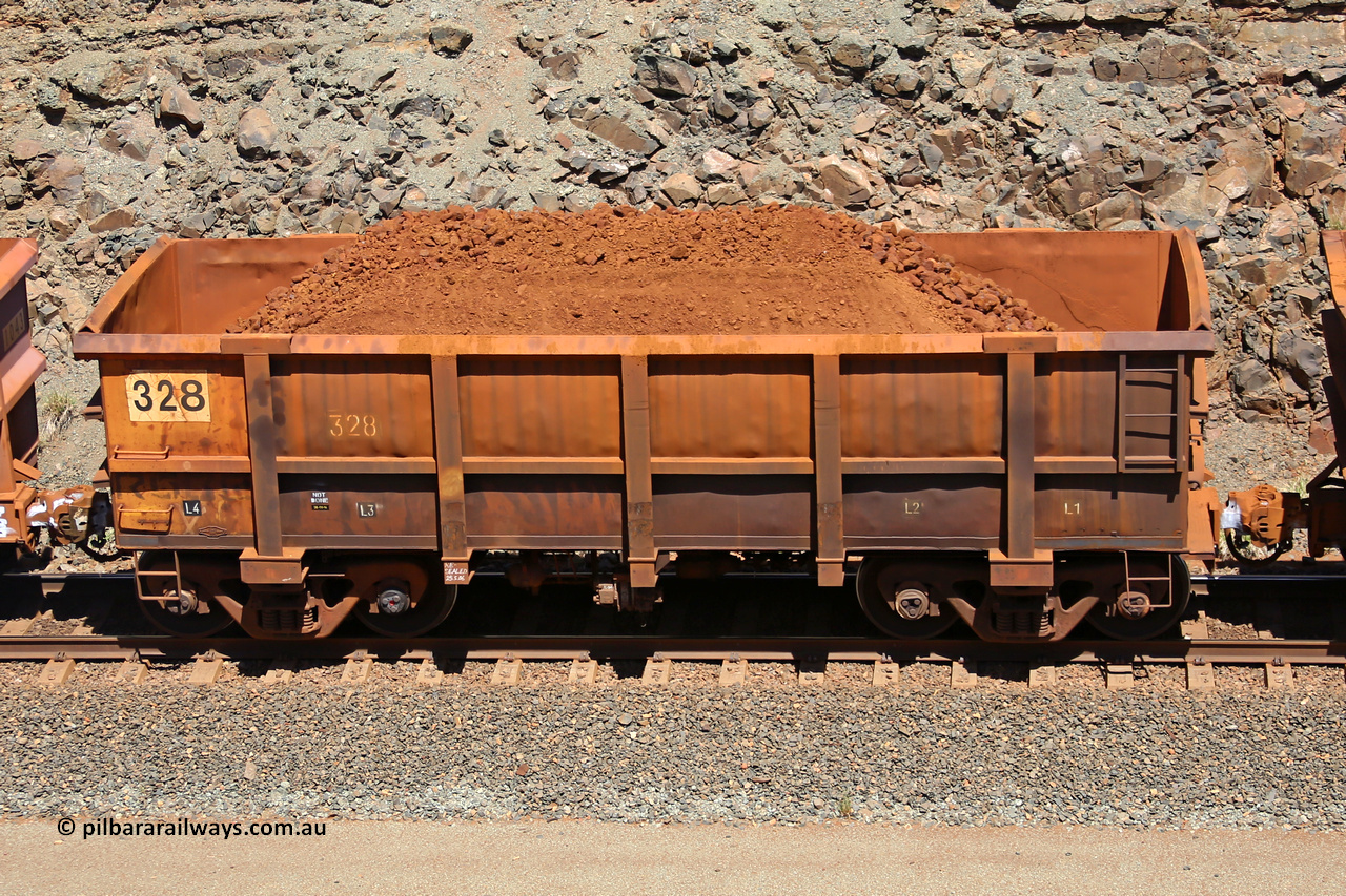 0328 160306 1512
Robe River ore waggon 328, built by Nippon Sharyo Nihon, fixed coupler non-handbrake side loaded view at the 45 km, Harding Siding on the Cape Lambert line. March 6, 2016.
Keywords: 328;Nippon-Sharyo-Nihon;Robe-ore-waggon;