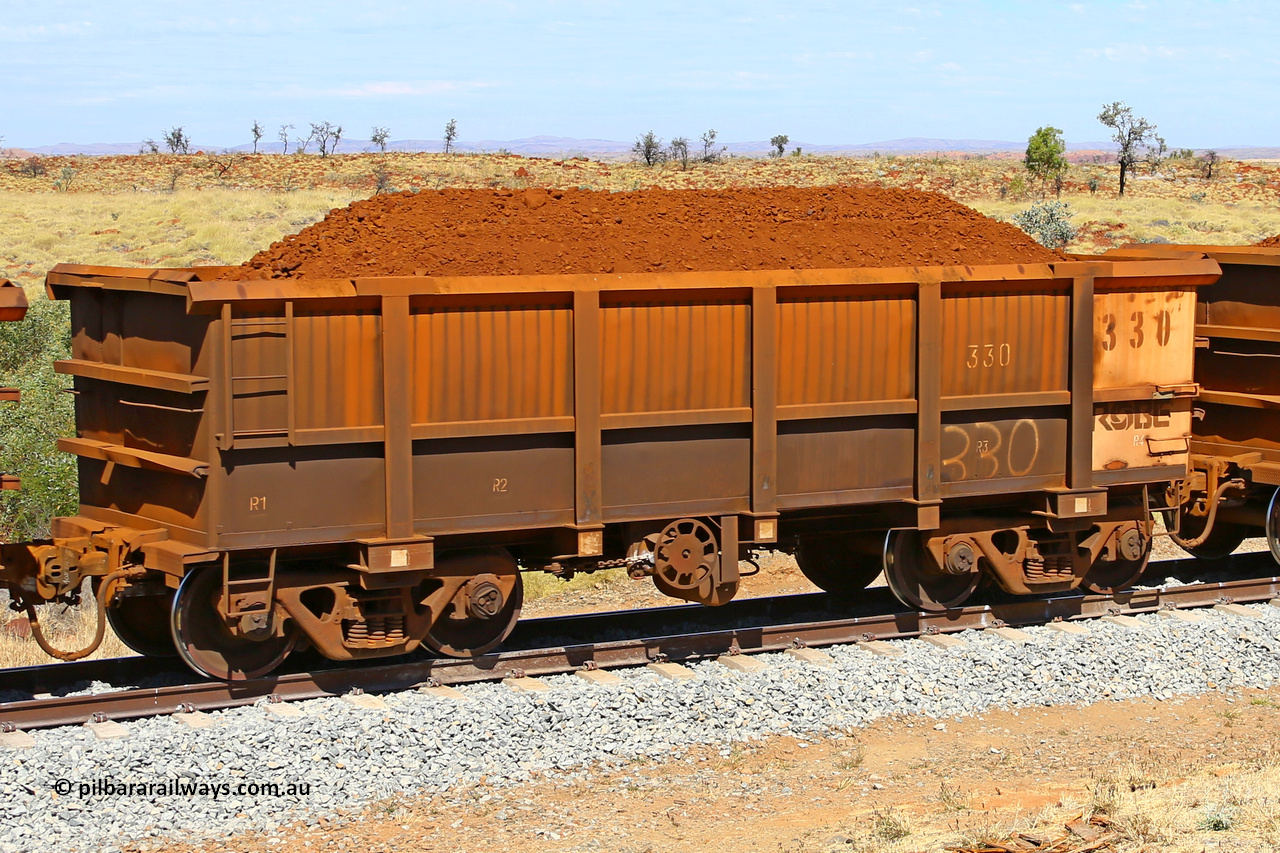0330 170729 0224
Robe River ore waggon 330, built by Nippon Sharyo Nihon, fixed coupler handbrake side loaded view at the 103 km, between Maitland Siding and the Fortescue River on the Deepdale line. July 29, 2017.
Keywords: 330;Nippon-Sharyo-Nihon;Robe-ore-waggon;