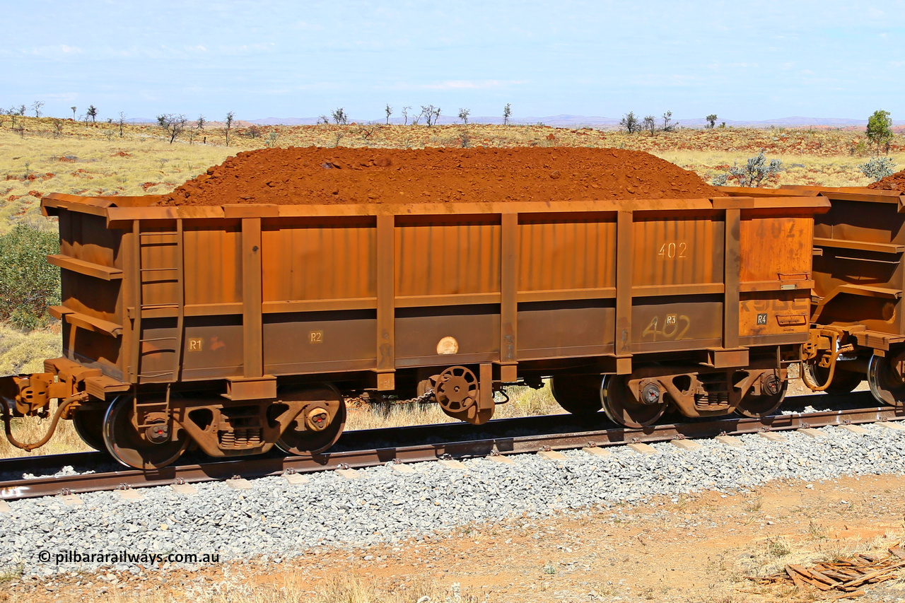 0402 170729 0233
Robe River ore waggon 402, built by Tomlinson Steel WA, fixed coupler handbrake side loaded view at the 103 km, between Maitland Siding and the Fortescue River on the Deepdale line. July 29, 2017.
Keywords: 402;Tomlinson-Steel-WA;Robe-ore-waggon;