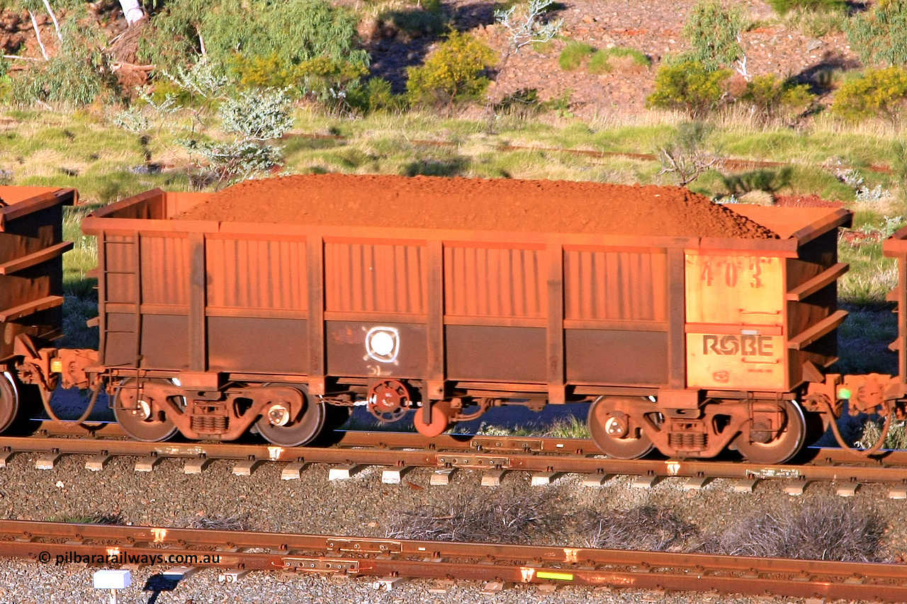 0403 110602 1654
Robe River ore waggon 403, built by Tomlinson Steel WA, rotary coupler end handbrake side loaded view at the 71 km, Western Creek on the Deepdale line. June 2, 2011.
Keywords: 403;Tomlinson-Steel-WA;Robe-ore-waggon;