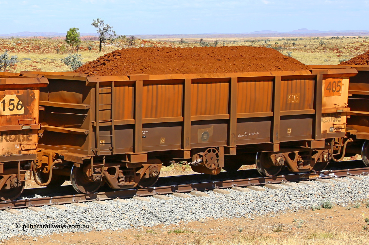 0405 170729 0229
Robe River ore waggon 405, built by Tomlinson Steel WA, fixed coupler handbrake side loaded view at the 103 km, between Maitland Siding and the Fortescue River on the Deepdale line. July 29, 2017.
Keywords: 405;Tomlinson-Steel-WA;Robe-ore-waggon;
