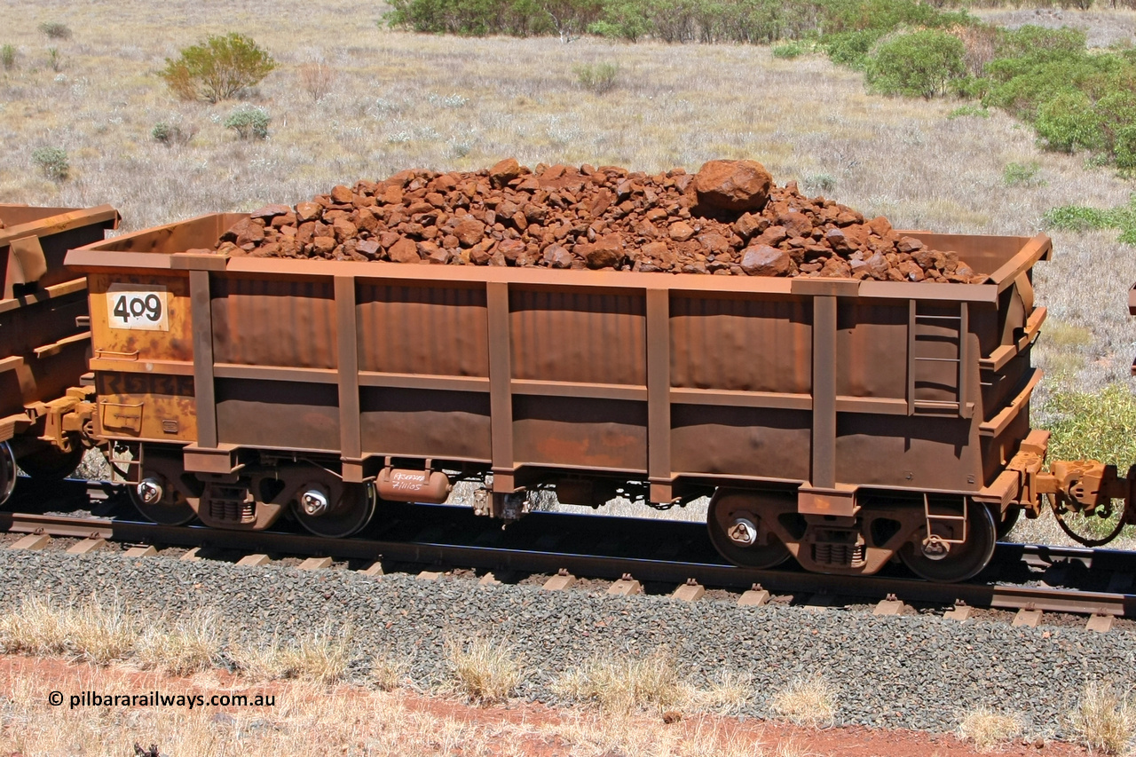 0409 081209 0155
Robe River ore waggon 409, built by Tomlinson Steel WA, fixed coupler non-handbrake side loaded view at the 7 km location just south of Cape Lambert yard. December 9, 2008.
Keywords: 409;Tomlinson-Steel-WA;Robe-ore-waggon;