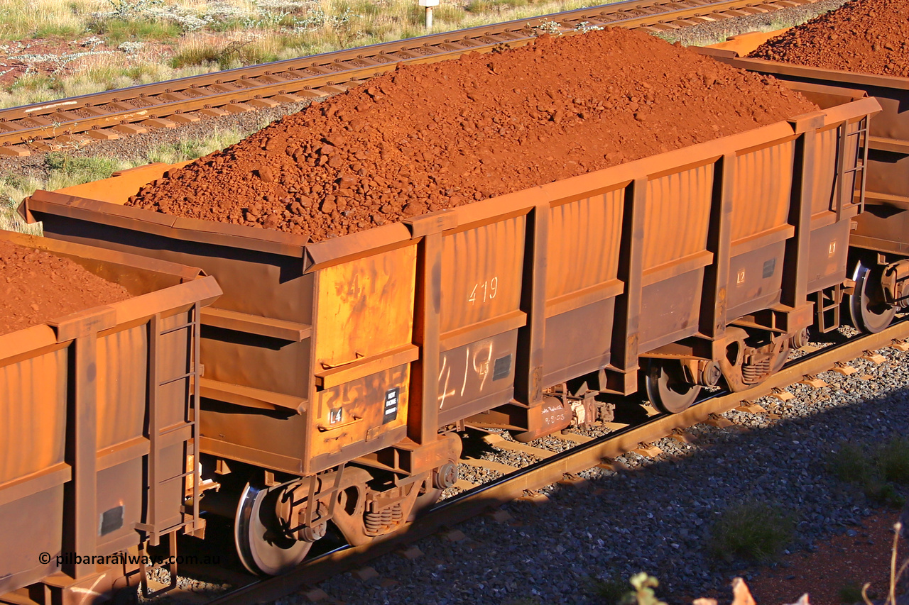 0419 210322 9721
Robe River ore waggon 419, built by Tomlinson Steel WA, rotary coupler end non-handbrake side loaded view at the 17 km on the Cape Lambert line, March 22, 2021.
Keywords: 419;Tomlinson-Steel-WA;Robe-ore-waggon;