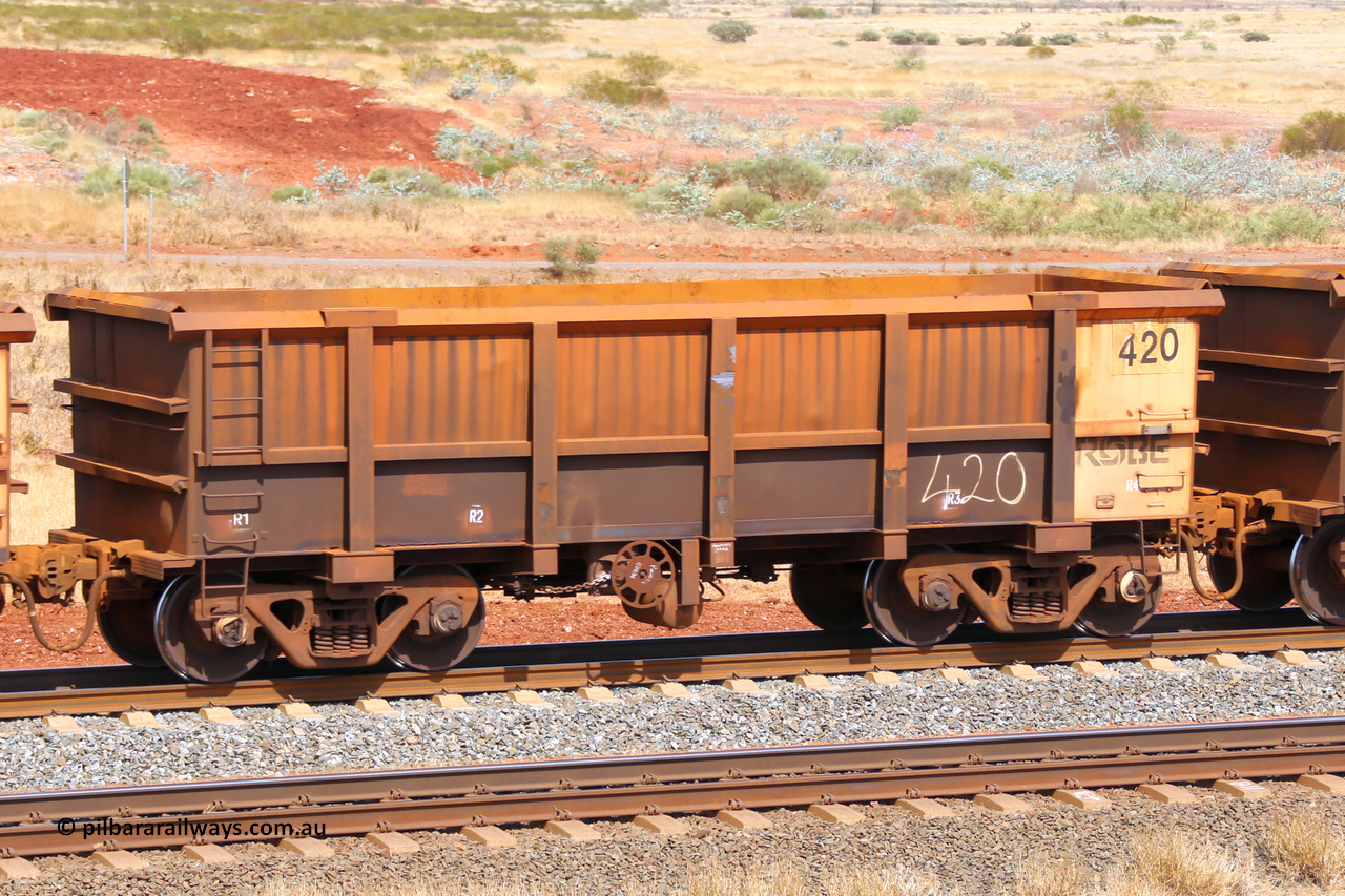 0420 141124 6795
Robe River ore waggon 420, built by Tomlinson Steel WA, fixed coupler handbrake side empty view at the 25 km at Arches Siding on the Cape Lambert line. November 24, 2014.
Keywords: 420;Tomlinson-Steel-WA;Robe-ore-waggon;