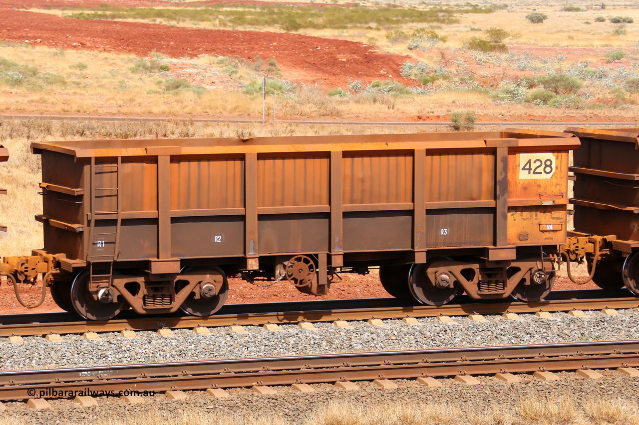 0428 141124 6855
Robe River ore waggon 428, built by Tomlinson Steel WA, fixed coupler handbrake side empty view at the 25 km at Arches Siding on the Cape Lambert line. November 24, 2014.
Keywords: 428;Tomlinson-Steel-WA;Robe-ore-waggon;