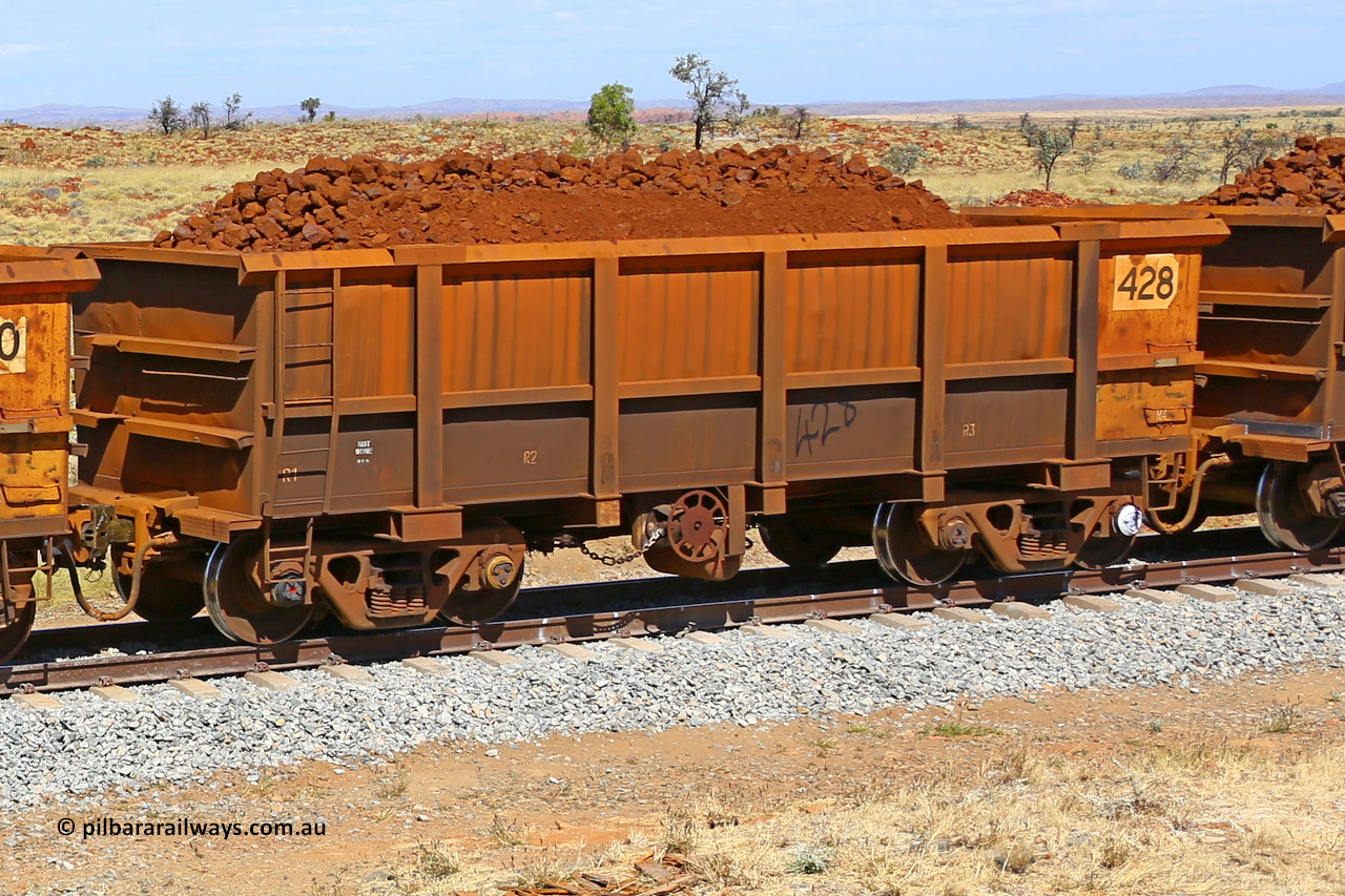 0428 170729 0195
Robe River ore waggon 428, built by Tomlinson Steel WA, fixed coupler handbrake side loaded view at the 103 km, between Maitland Siding and the Fortescue River on the Deepdale line. July 29, 2017.
Keywords: 428;Tomlinson-Steel-WA;Robe-ore-waggon;