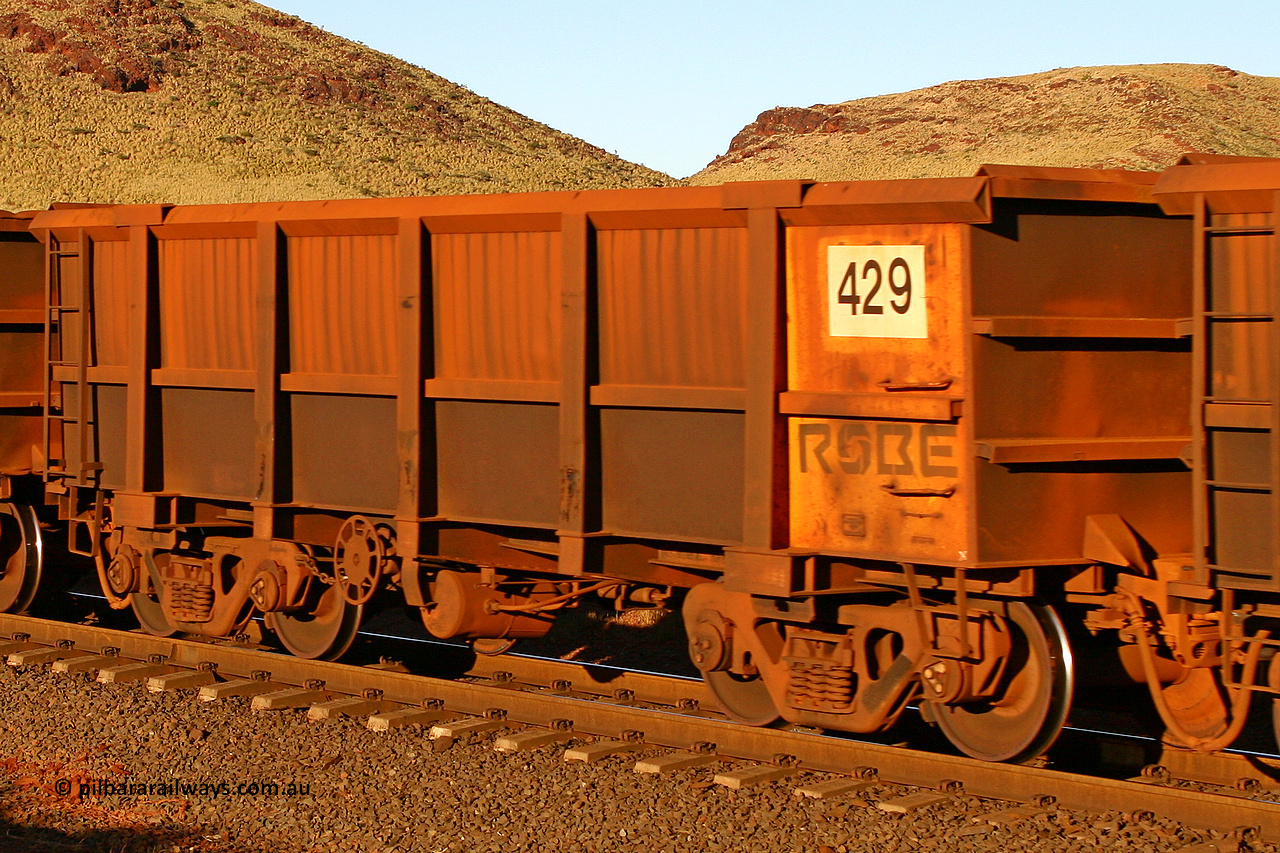 0429 060722 7608
Robe River ore waggon 429, built by Tomlinson Steel WA, rotary coupler end handbrake side empty view, at the 11.7 km, Cape Lambert. July 22, 2006.
Keywords: 429;Tomlinson-Steel-WA;Robe-ore-waggon;