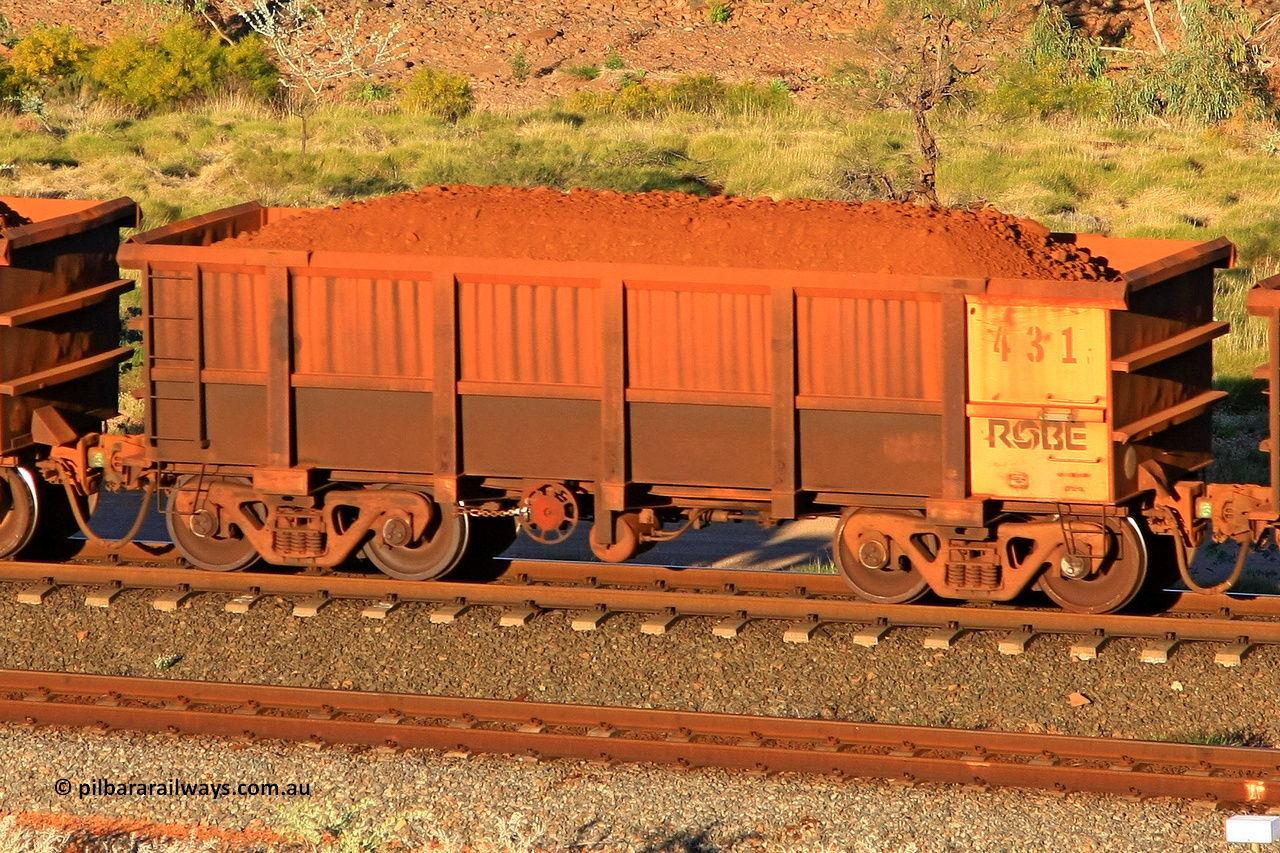 0431 110602 1682
Robe River ore waggon 431, built by Tomlinson Steel WA, rotary coupler end handbrake side loaded view at the 71 km, Western Creek on the Deepdale line. June 2, 2011.
Keywords: 431;Tomlinson-Steel-WA;Robe-ore-waggon;