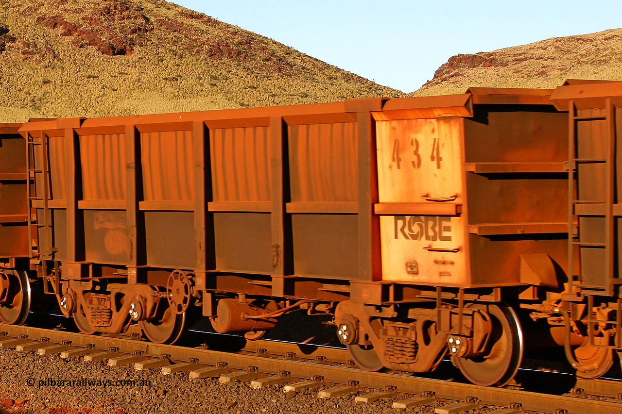 0434 060722 7596
Robe River ore waggon 434, built by Tomlinson Steel WA, rotary coupler end handbrake side empty view, at the 11.7 km, Cape Lambert. July 22, 2006.
Keywords: 434;Tomlinson-Steel-WA;Robe-ore-waggon;