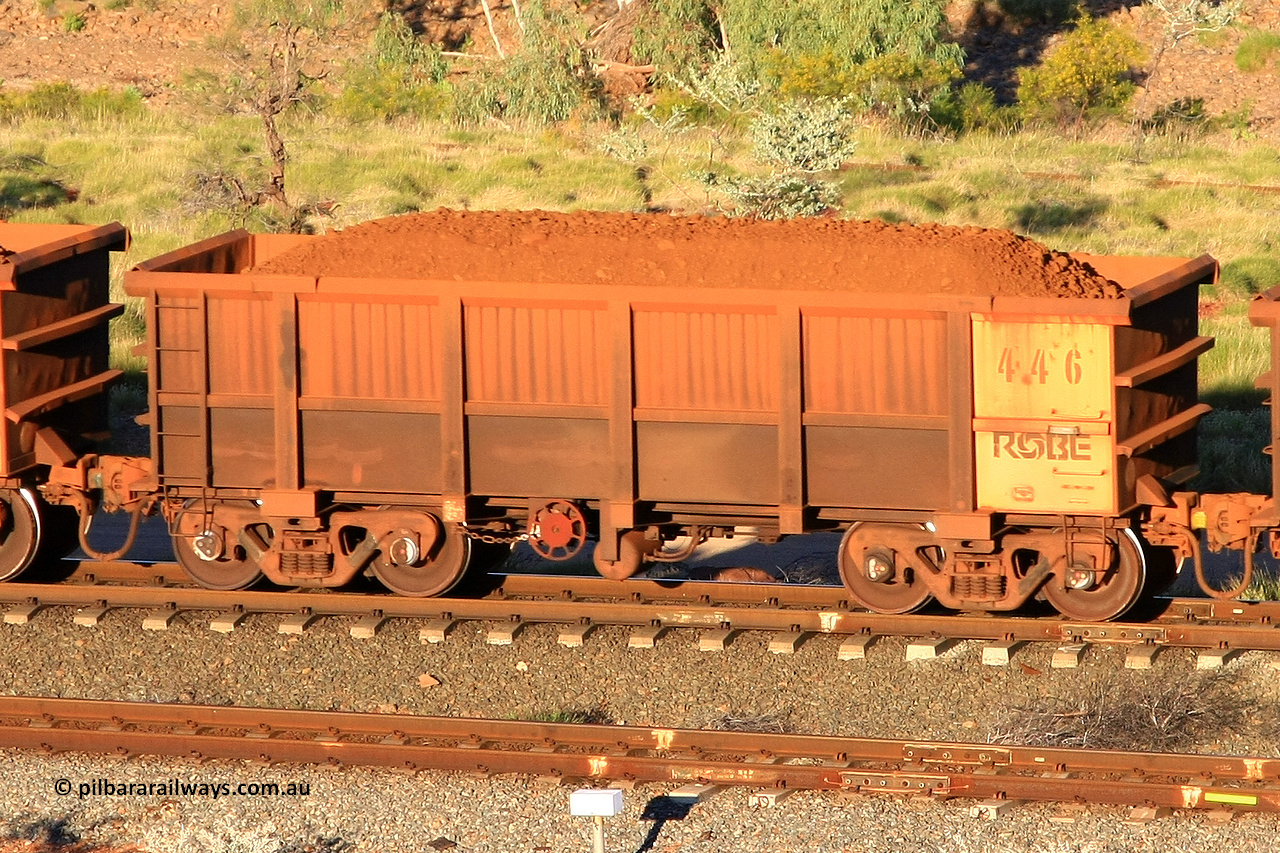 0446 110602 1603
Robe River ore waggon 446, built by Tomlinson Steel WA, rotary coupler end handbrake side loaded view at the 71 km, Western Creek on the Deepdale line. June 2, 2011.
Keywords: 446;Tomlinson-Steel-WA;Robe-ore-waggon;