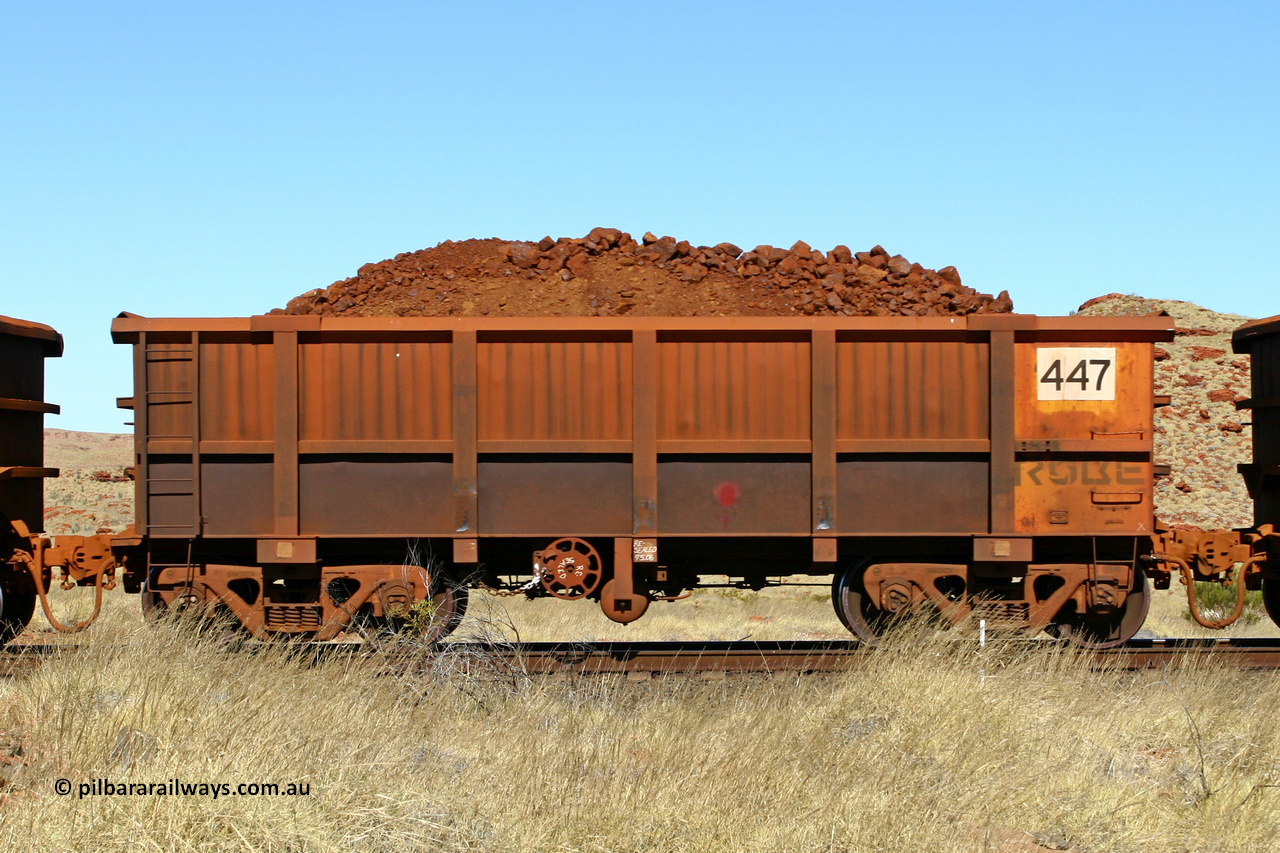 0447 060722 7499
Robe River ore waggon 447, built by Tomlinson Steel WA, handbrake side loaded view at the 78.8 km between Western Creek and Maitland on the Deepdale line. July 22, 2006.
Keywords: 447;Tomlinson-Steel-WA;Robe-ore-waggon;