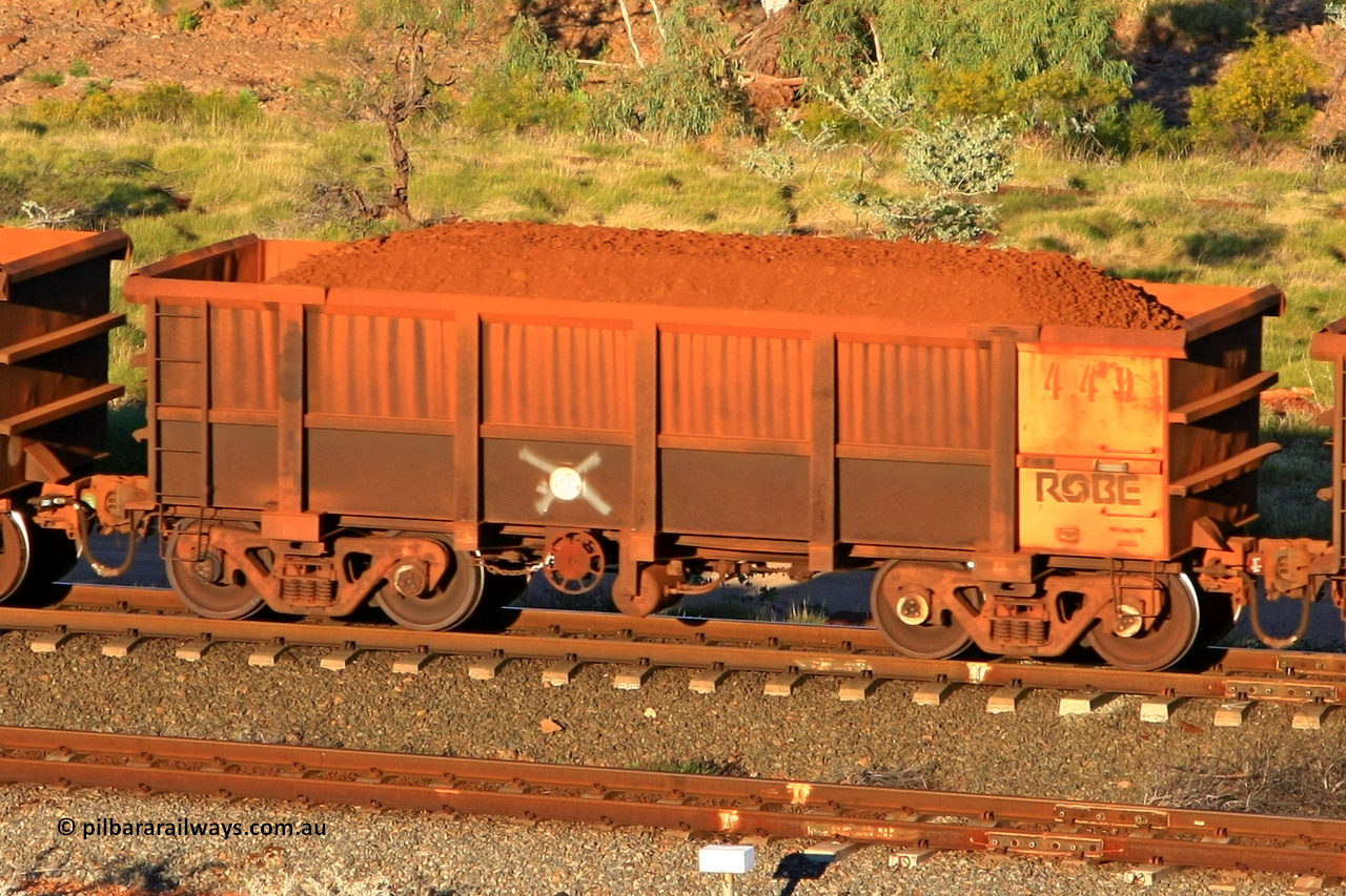 0449 110602 1619
Robe River ore waggon 449, built by Tomlinson Steel WA, rotary coupler end handbrake side loaded view at the 71 km, Western Creek on the Deepdale line. June 2, 2011.
Keywords: 449;Tomlinson-Steel-WA;Robe-ore-waggon;