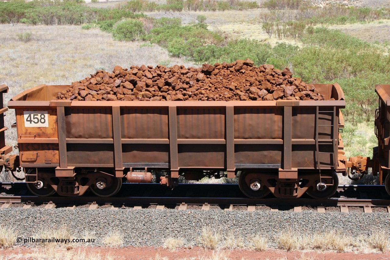 0458 081209 0117
Robe River ore waggon 458, built by Tomlinson Steel WA, non-handbrake side loaded view at the 7 km location just south of Cape Lambert yard. December 9, 2008.
Keywords: 458;Tomlinson-Steel-WA;Robe-ore-waggon;