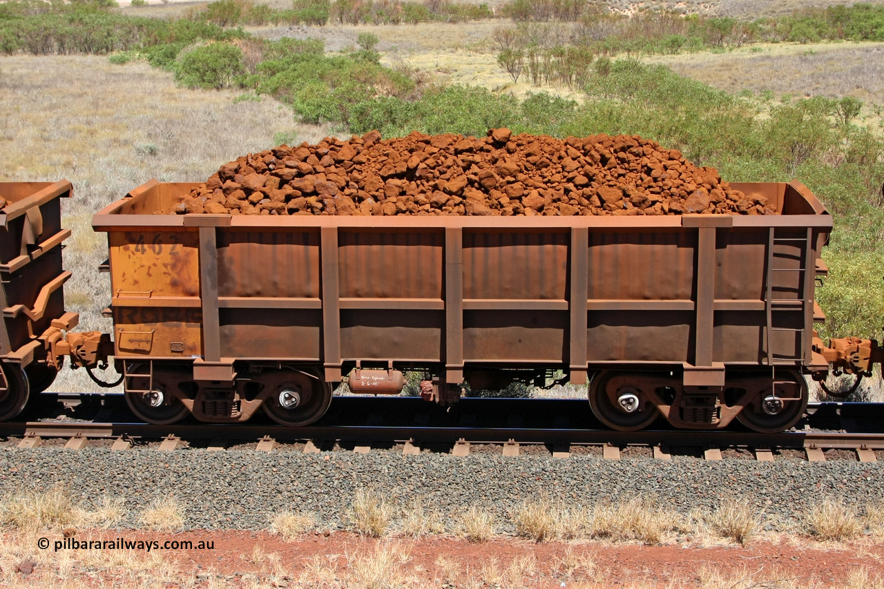 0462 081209 0132
Robe River ore waggon 462, built by Tomlinson Steel WA, non-handbrake side loaded view at the 7 km location just south of Cape Lambert yard. December 9, 2008.
Keywords: 462;Tomlinson-Steel-WA;Robe-ore-waggon;