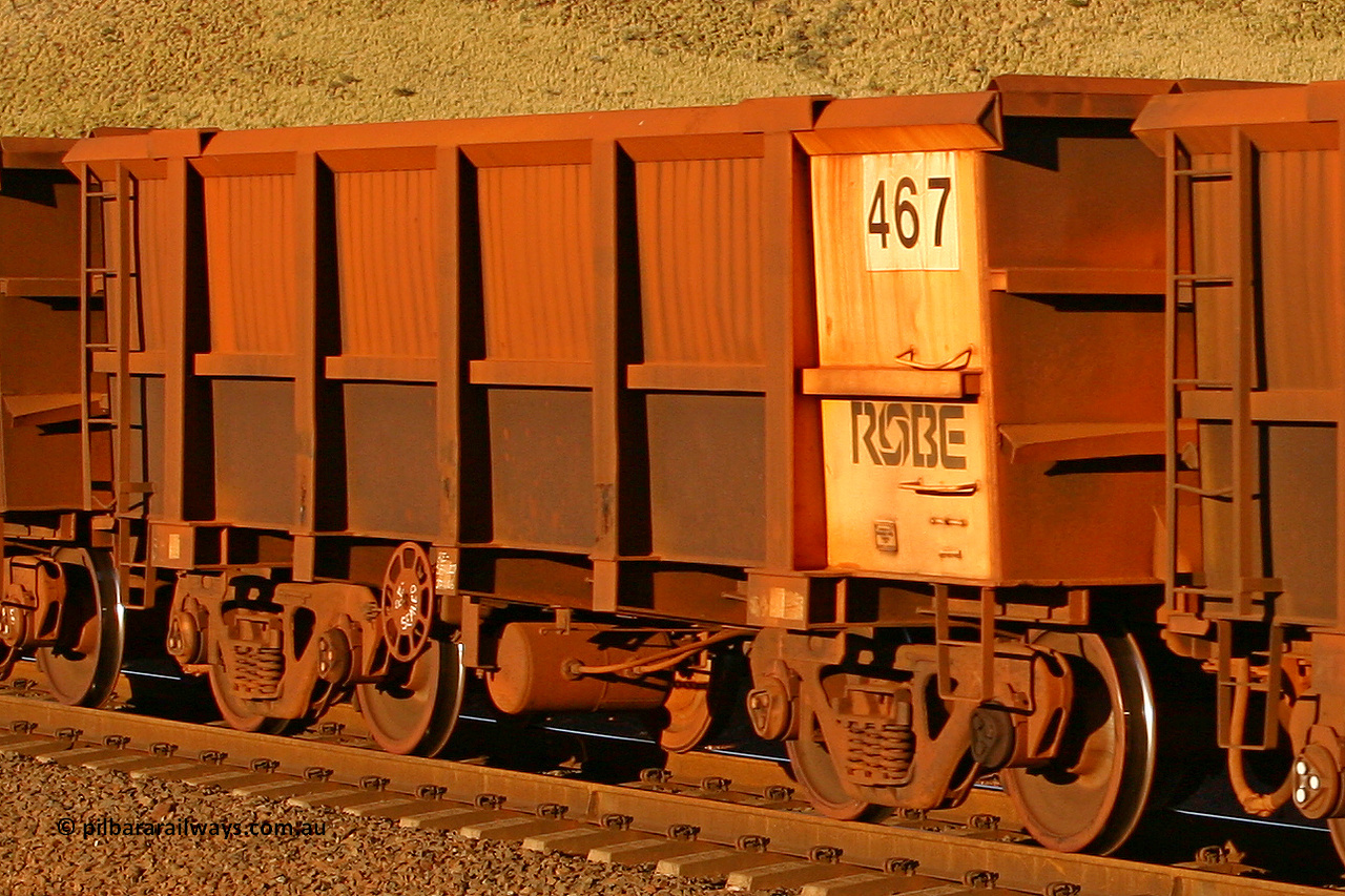 0467 060722 7605
Robe River ore waggon 467, built by Tomlinson Steel WA, rotary coupler end handbrake side empty view, at the 11.7 km, Cape Lambert. July 22, 2006.
Keywords: 467;Tomlinson-Steel-WA;Robe-ore-waggon;