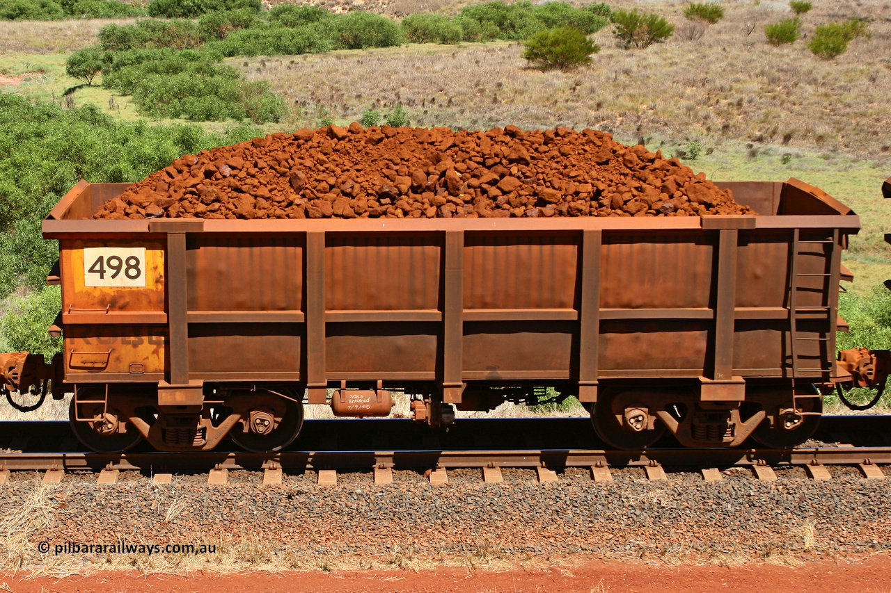 0498 061209 8184
Robe River ore waggon 498, built by Tomlinson Steel WA, non-handbrake side loaded view at the 7 km location just south of Cape Lambert yard. December 9, 2006.
Keywords: 498;Tomlinson-Steel-WA;Robe-ore-waggon;