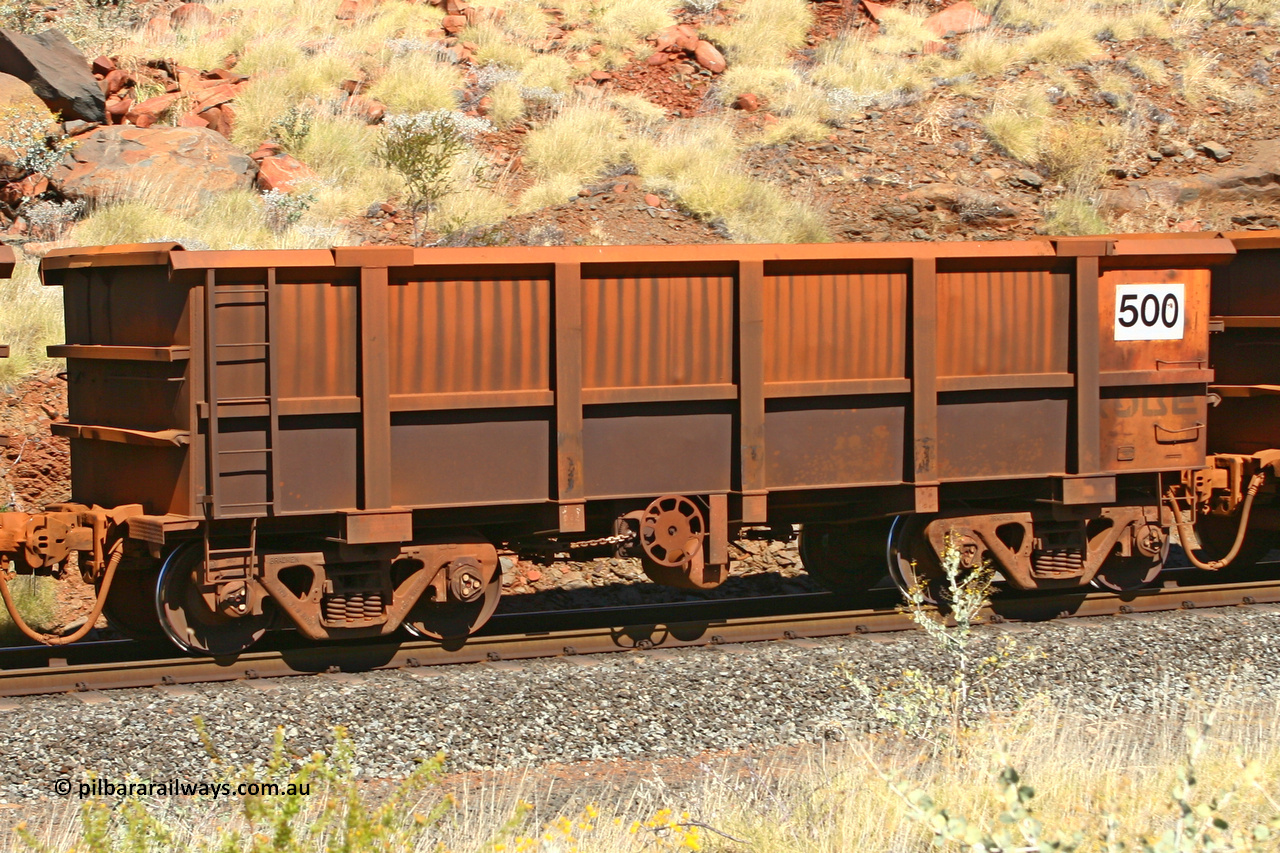 0500 060724 7916
Robe River ore waggon 500, built by Tomlinson Steel WA, fixed coupler handbrake side empty view at the 74 km, Western Creek on the Deepdale line. July 24, 2006.
Keywords: 500;Tomlinson-Steel-WA;Robe-ore-waggon;