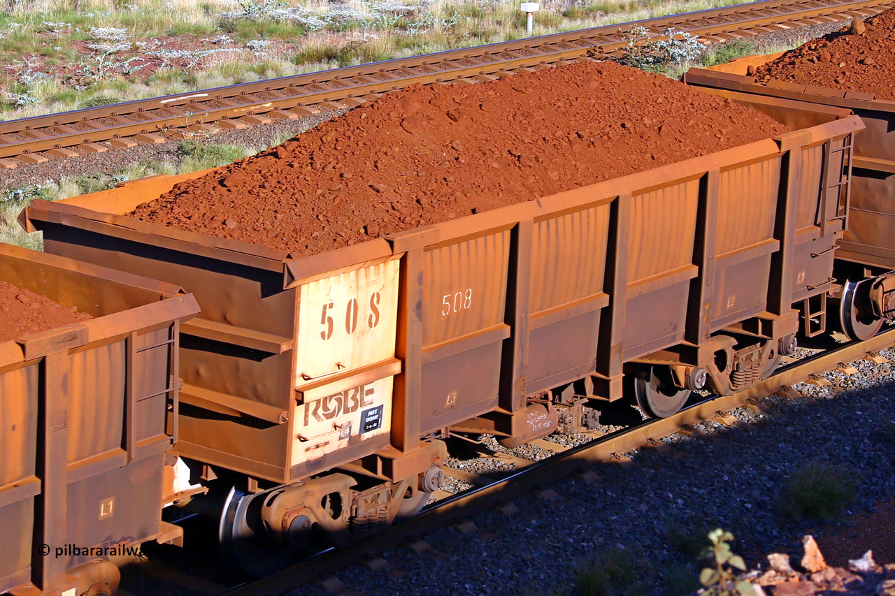 0508 210322 9747
Robe River ore waggon 508, built by Tomlinson Steel WA, rotary coupler end non-handbrake side loaded view at the 17 km on the Cape Lambert line, March 22, 2021.
Keywords: 508;Tomlinson-Steel-WA;Robe-ore-waggon;
