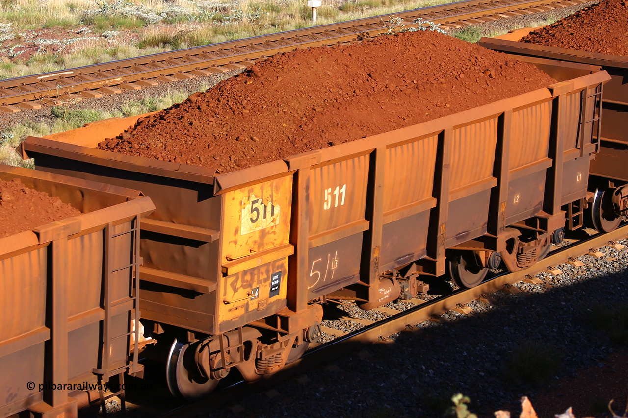 0511 210322 9741
Robe River ore waggon 511, built by Tomlinson Steel WA, rotary coupler end non-handbrake side loaded view at the 17 km on the Cape Lambert line, March 22, 2021.
Keywords: 511;Tomlinson-Steel-WA;Robe-ore-waggon;