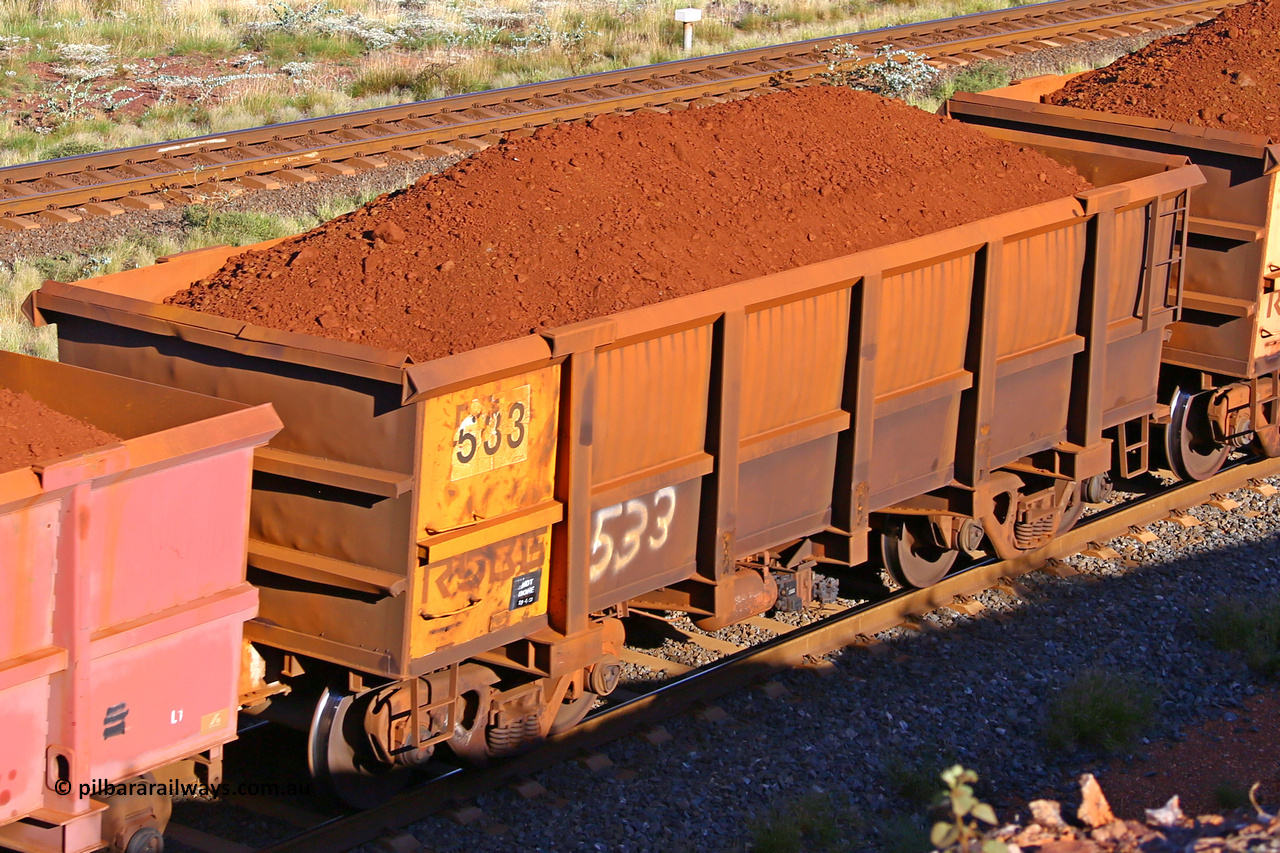 0533 210322 9753
Robe River ore waggon 533, built by Tomlinson Steel WA, rotary coupler end non-handbrake side loaded view at the 17 km on the Cape Lambert line, March 22, 2021.
Keywords: 533;Tomlinson-Steel-WA;Robe-ore-waggon;