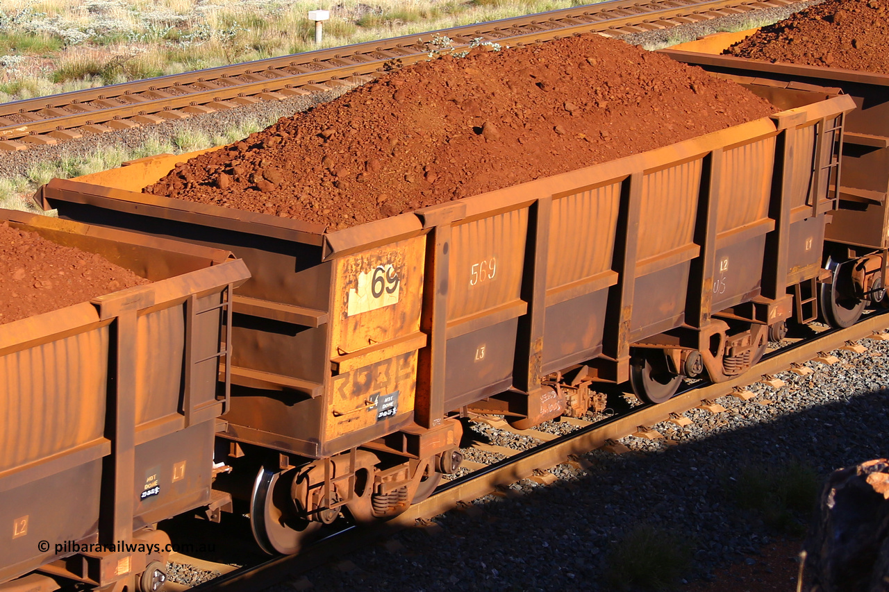 0569 210322 9783
Robe River ore waggon 569, built by Tomlinson Steel WA, rotary coupler end non-handbrake side loaded view at the 17 km on the Cape Lambert line, March 22, 2021.
Keywords: 569;Tomlinson-Steel-WA;Robe-ore-waggon;
