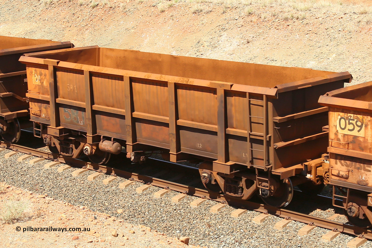 0581 160306 1324
Robe River ore waggon 581, built by Tomlinson Steel WA, fixed coupler non-handbrake side empty view at Greenpool on the Cape Lambert line. March 6, 2016.
Keywords: 581;Tomlinson-Steel-WA;Robe-ore-waggon;