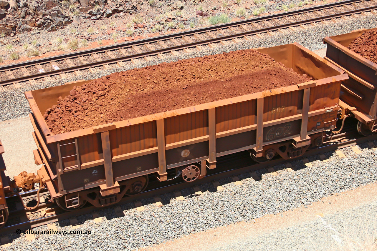 0602 160306 1469
Robe River ore waggon 602, built by Tomlinson Steel WA, fixed coupler handbrake side loaded view, at the 45 km, Harding Siding on the Cape Lambert line. March 6, 2016.
Keywords: 602;Tomlinson-Steel-WA;Robe-ore-waggon;
