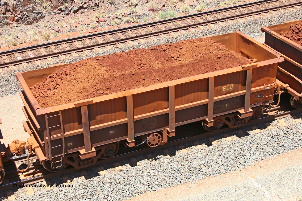 0608 160306 1468
Robe River ore waggon 608, built by Tomlinson Steel WA, fixed coupler handbrake side loaded view, at the 45 km, Harding Siding on the Cape Lambert line. March 6, 2016.
Keywords: 608;Tomlinson-Steel-WA;Robe-ore-waggon;