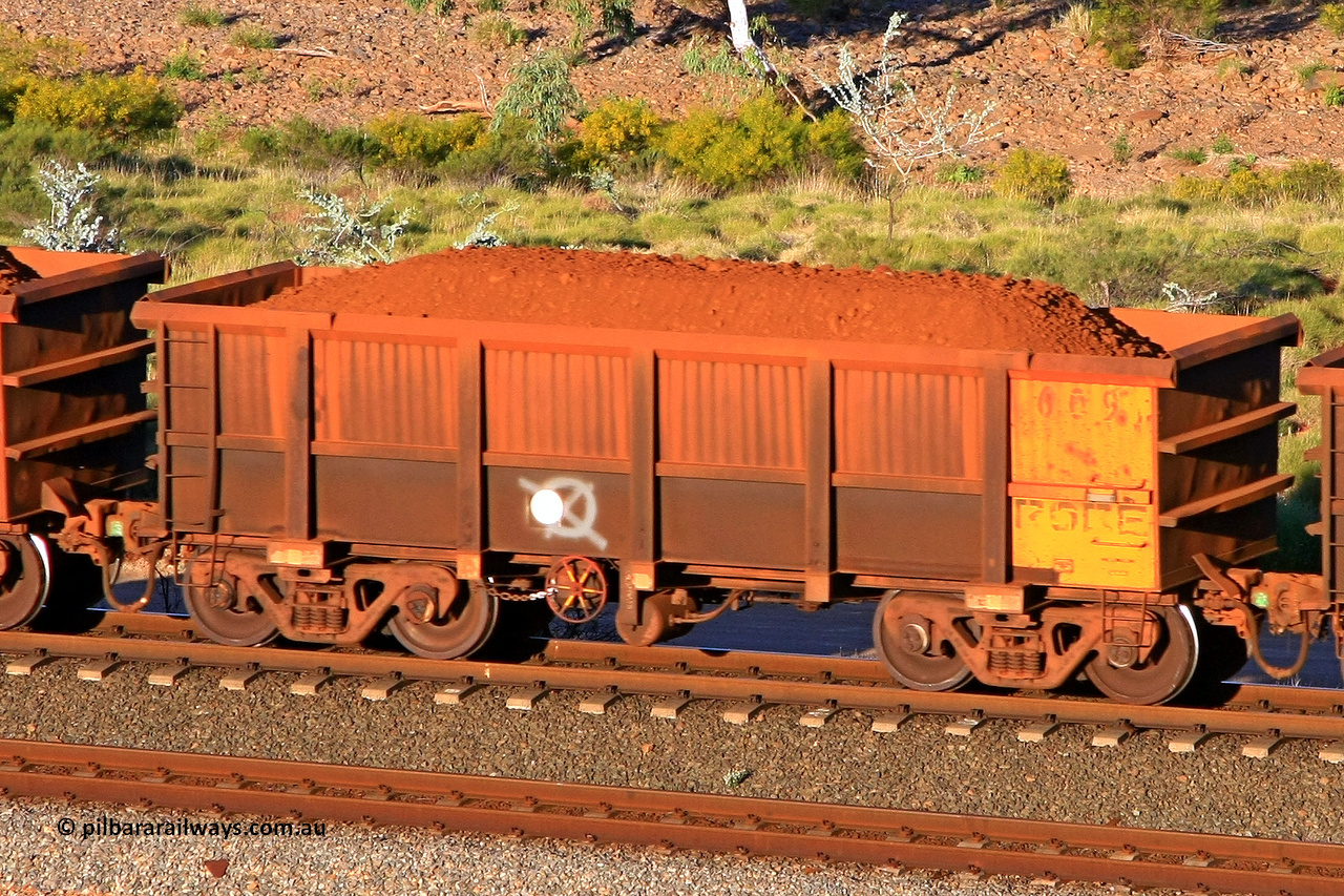 0609 110602 1696
Robe River ore waggon 609, built by Tomlinson Steel WA, rotary coupler end handbrake side loaded view at the 71 km, Western Creek on the Deepdale line. June 2, 2011.
Keywords: 609;Tomlinson-Steel-WA;Robe-ore-waggon;