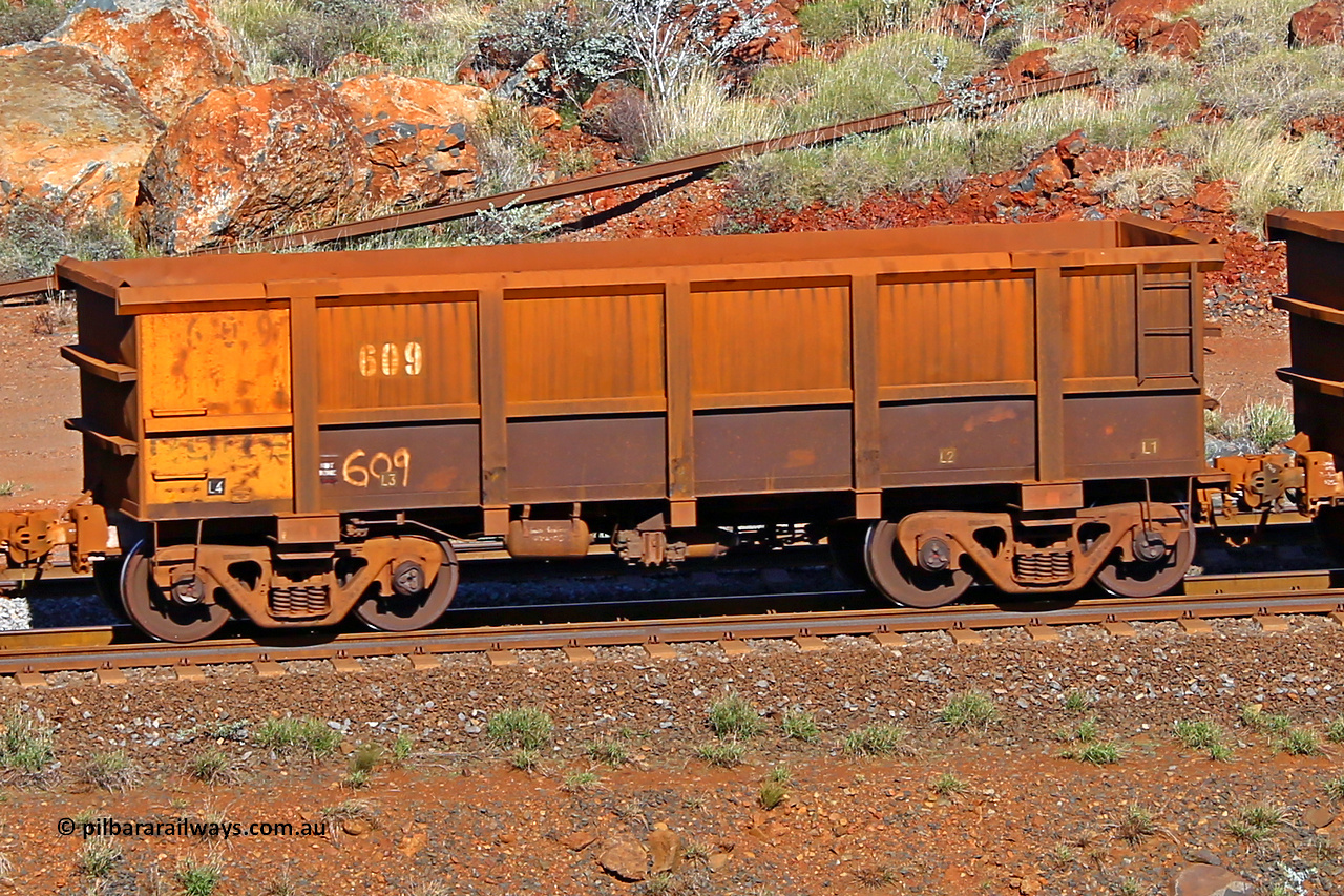 0609 180616 1711
Robe River ore waggon 609, built by Tomlinson Steel WA, rotary coupler end non-handbrake side empty view at the 38 km, Harding on the Cape Lambert line, June 16, 2018.
Keywords: 609;Tomlinson-Steel-WA;Robe-ore-waggon;